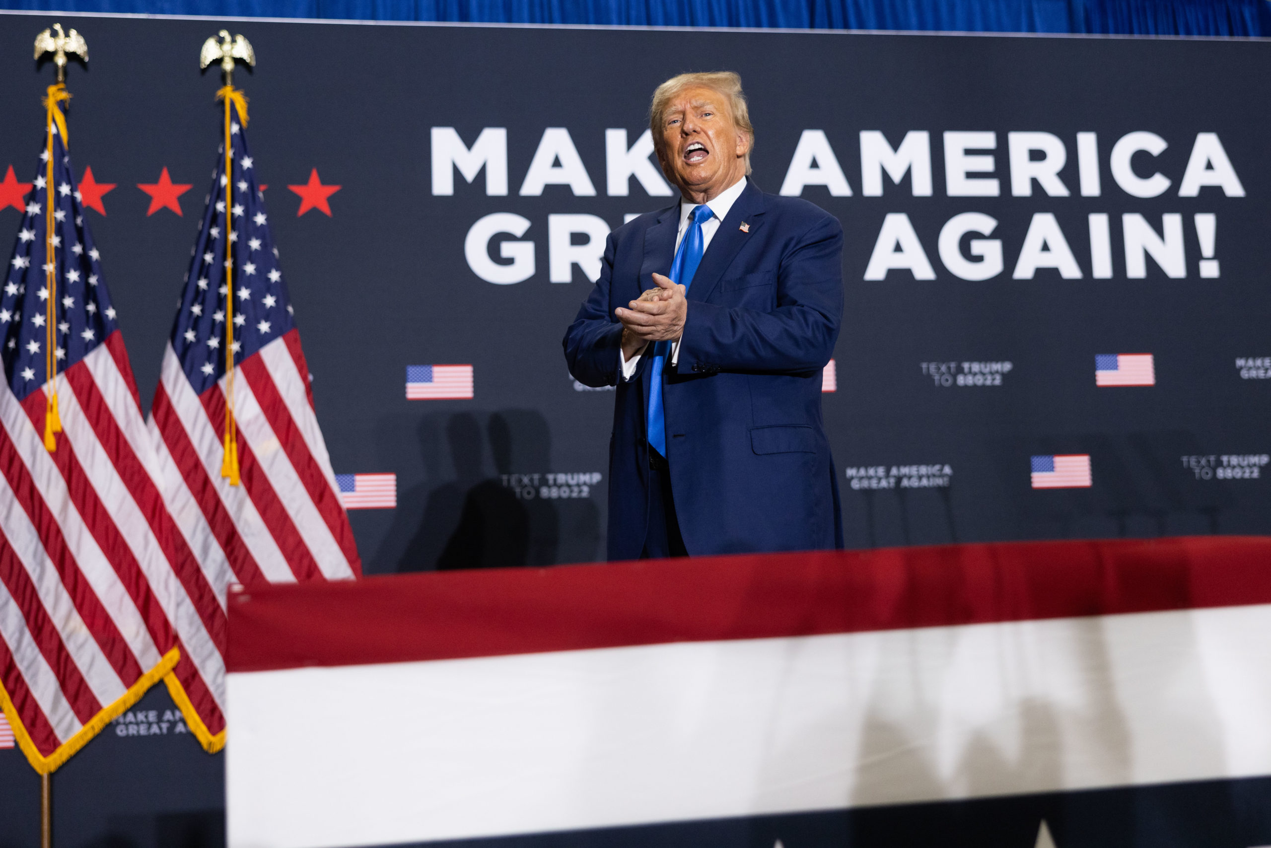 DERRY, NEW HAMPSHIRE - OCTOBER 23: Republican presidential candidate former President Donald Trump on stage after delivering remarks during a campaign event on October 23, 2023 in Derry, New Hampshire. Trump officially filed for the first-in-the-nation primary on Monday at the New Hampshire State House. (Photo by Scott Eisen/Getty Images)