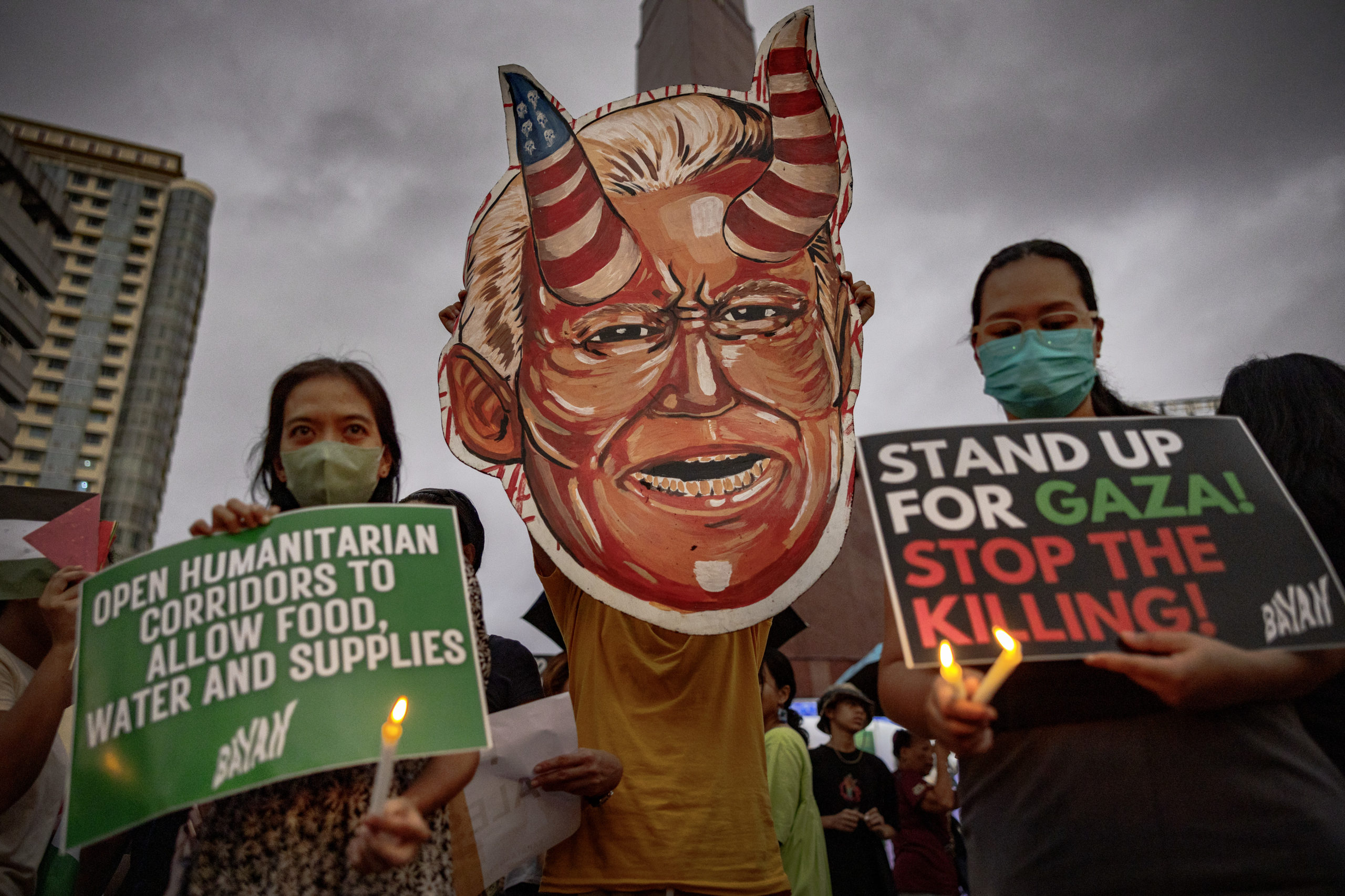 Filipinos hold up an effigy of US President Joe Biden as they take part in a protest to condemn the recent air strike at a Gaza hospital that killed hundreds, on October 18, 2023 in Quezon city, Metro Manila, Philippines. Palestinian officials said that more than 500 people were killed in an alleged Israeli air strike at the Ahli Arab Hospital in Gaza City. Israeli officials have suggested that the explosion was caused by a misfired rocket by Palestinian militants. (Photo by Ezra Acayan/Getty Images)