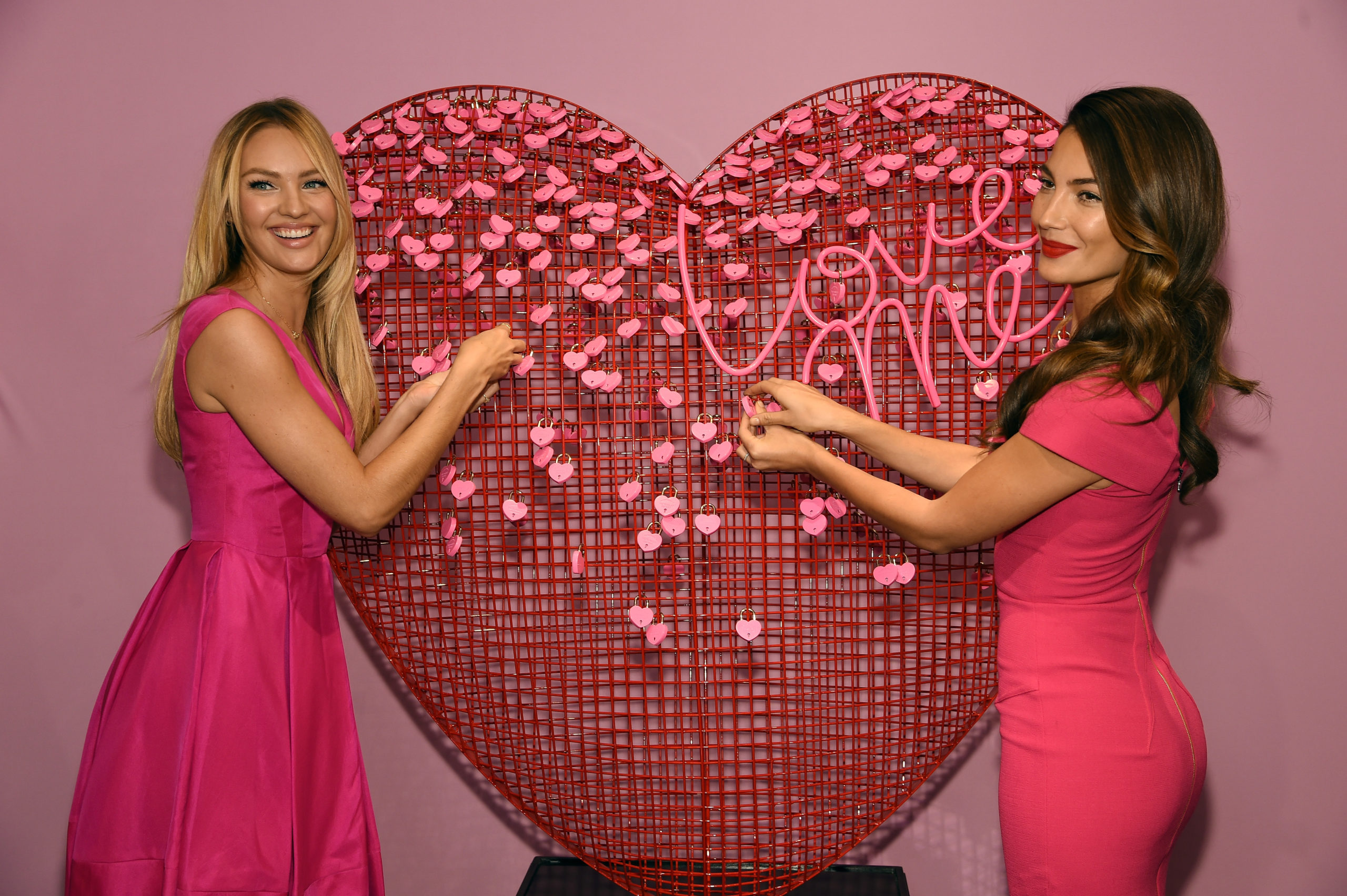 NEW YORK, NY - FEBRUARY 05: Victoria's Secret Angels Candice Swanepoel (L) and Lily Aldridge celebrate Valentine's Day In-Store at Victoria's Secret, Herald Square on February 5, 2015 in New York City. (Photo by Dimitrios Kambouris/Getty Images for Victoria's Secret)