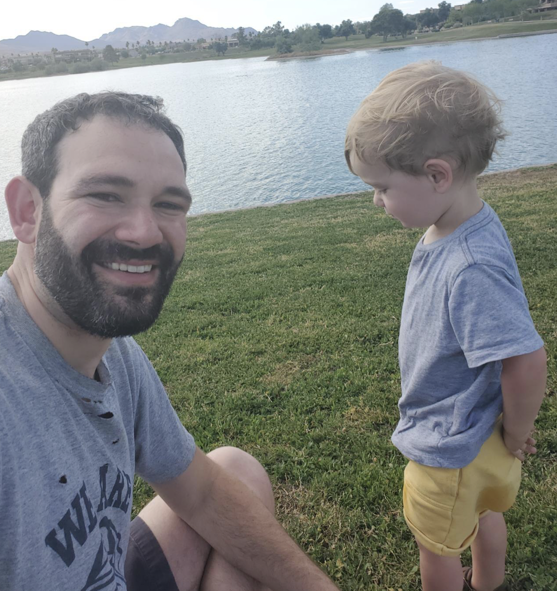 Representative Alexander Kolodin (R-LD 3) relaxes by a pond a few miles from Rio Verde Foothills with his son after sending the bill ending the water crisis to the Governor's desk (courtesy of Alexander Kolodin) 