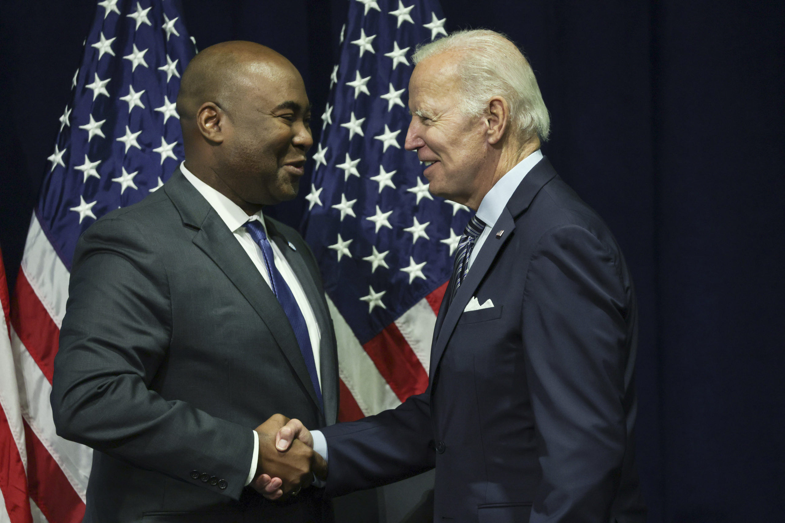NATIONAL HARBOR, MARYLAND - SEPTEMBER 08: U.S. President Joe Biden (R) greets Jaime Harrison, chairman of the Democratic National Committee (DNC), at the organization's summer meeting at the Gaylord National Resort & Convention Center September 8, 2022 in National Harbor, Maryland. The president, ahead of the November midterm elections, sharpened his attack against former President Trump, calling his MAGA Republican supporters a threat to democracy. (Photo by Alex Wong/Getty Images)