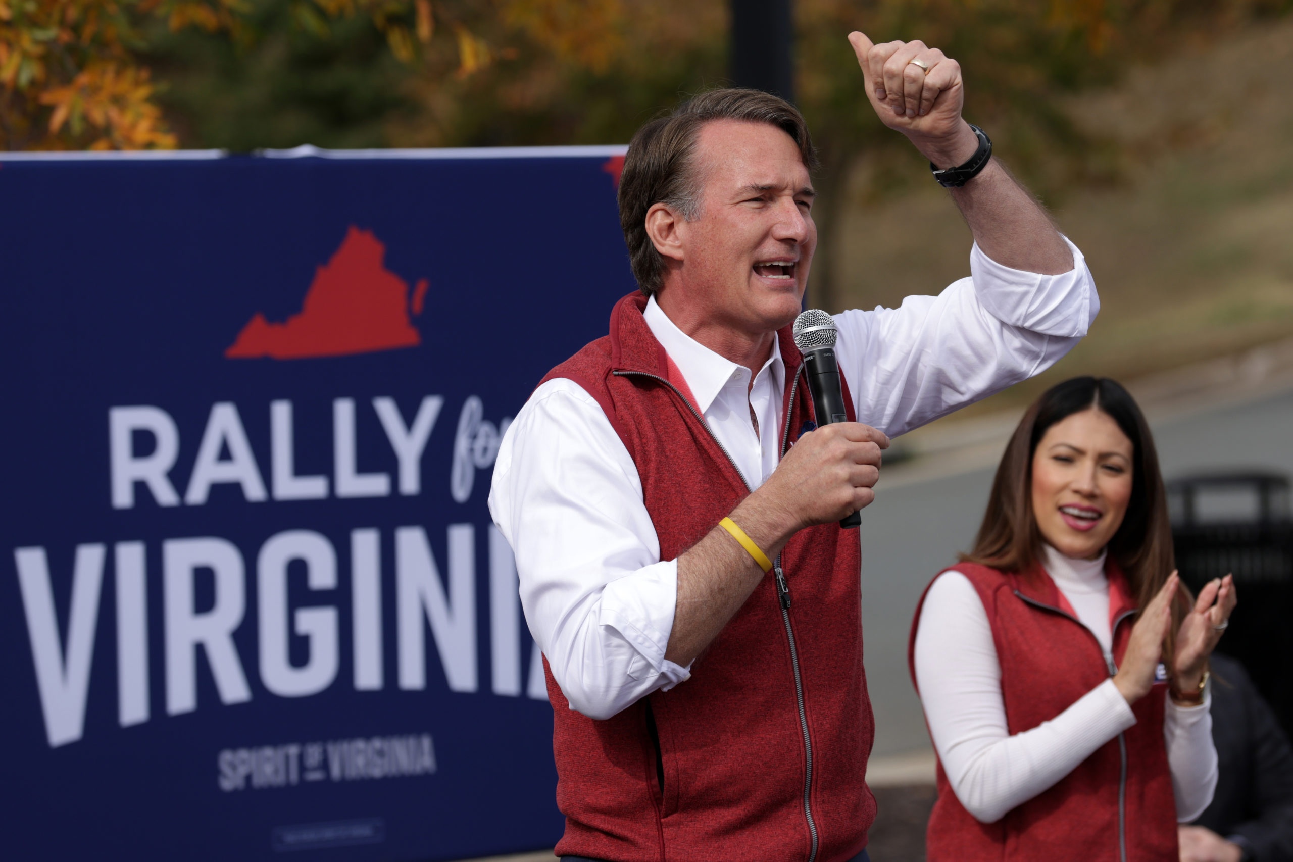 STAFFORD, VIRGINIA - OCTOBER 28: Republican U.S. House nominee Yesli Vega (R) listens to Virginia Gov. Glenn Youngkin (L) during a campaign rally on October 28, 2022 in Stafford, Virginia. Vega continued to campaign for the upcoming midterm election against incumbent U.S. Rep. Abigail Spanberger (D-VA) in Virginia’s 7th Congressional District. (Photo by Alex Wong/Getty Images)