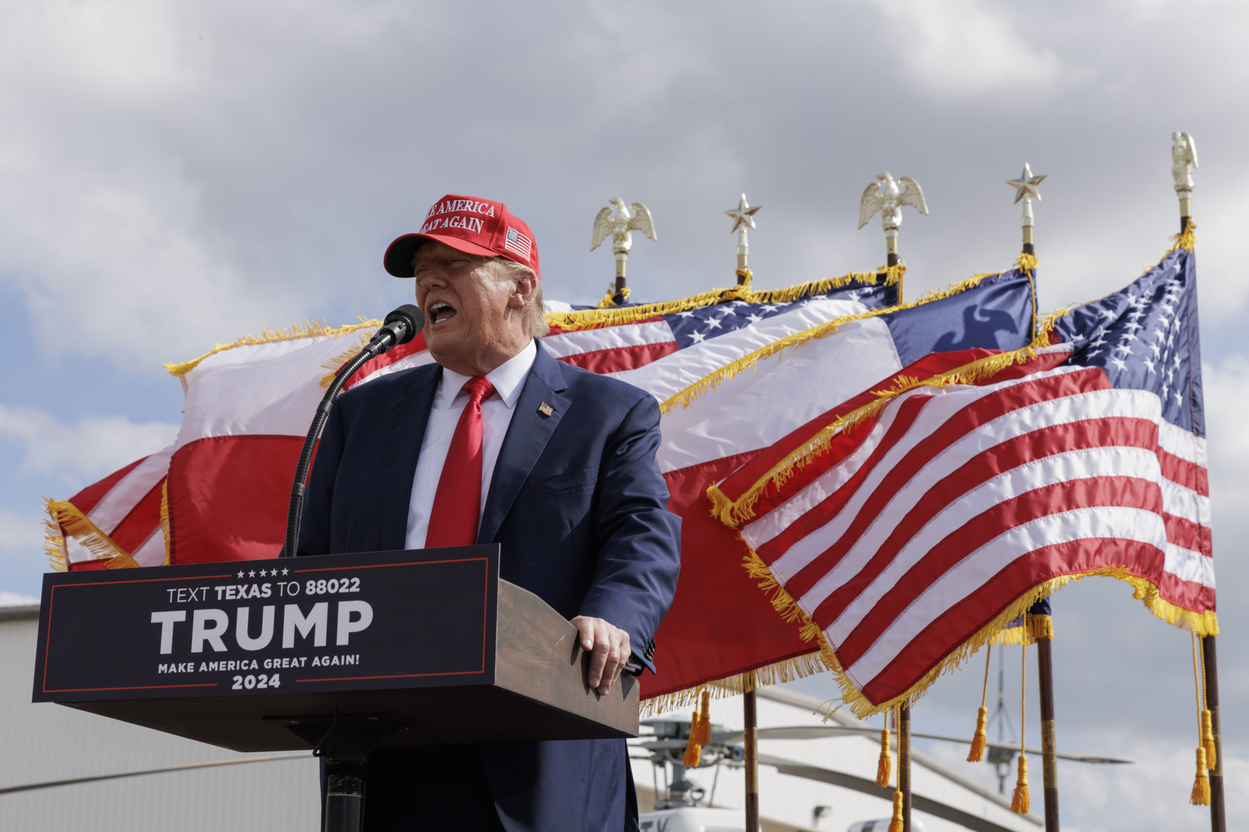 EDINBURG, TEXAS - NOVEMBER 19: Former President Donald Trump gives remarks at the South Texas International airport on November 19, 2023 in Edinburg, Texas. Trump took the stage shortly after Texas Governor Greg Abbott officially endorsed the former president for his 2024 presidential campaign. (Photo by Michael Gonzalez/Getty Images)