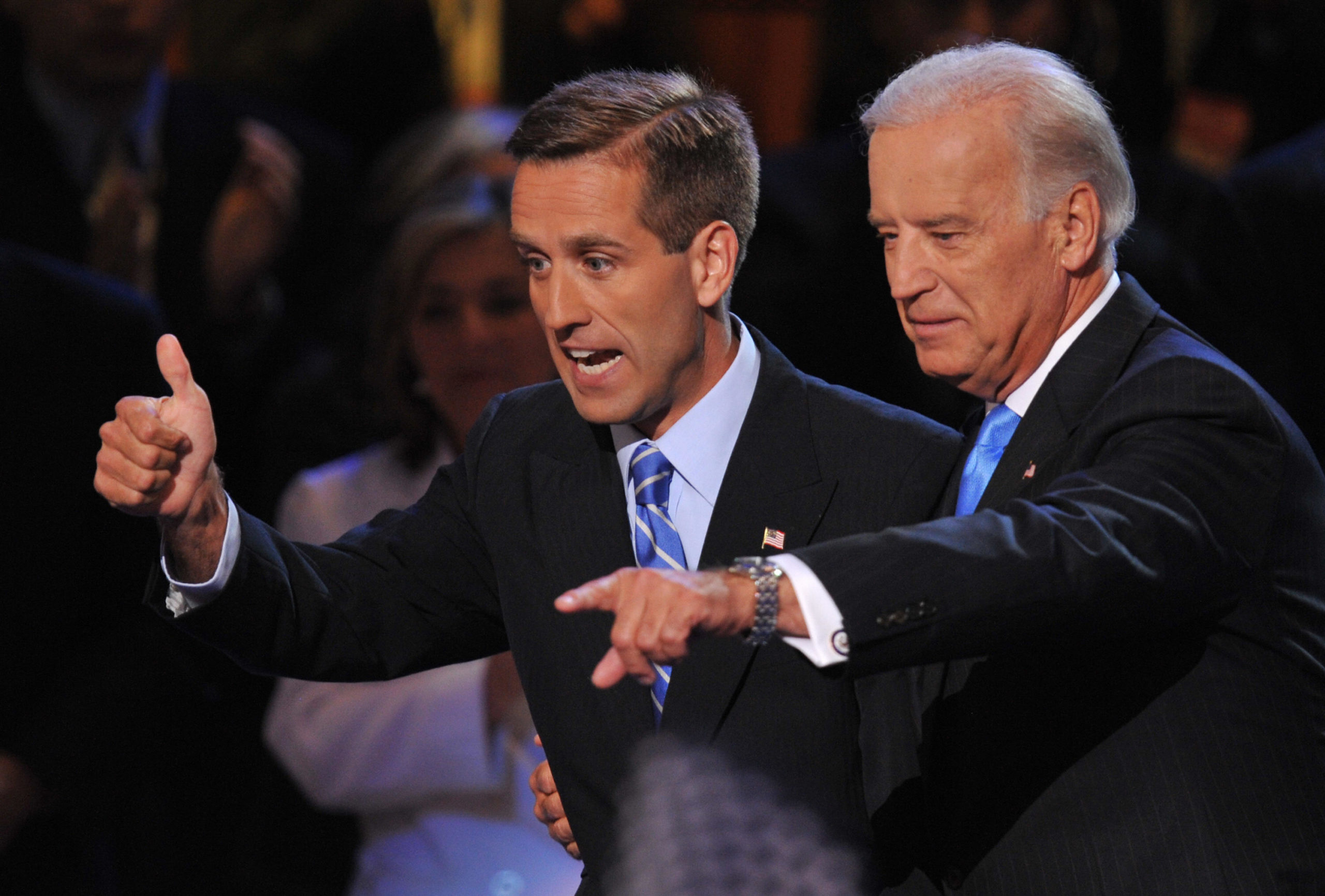 Democratic vice presidential nominee Joe Biden and his son Beau acknowledge the crowd during the Democratic National Convention August 27, 2008 at the Pepsi Center in Denver, Colorado. (PAUL J. RICHARDS/AFP via Getty Images)