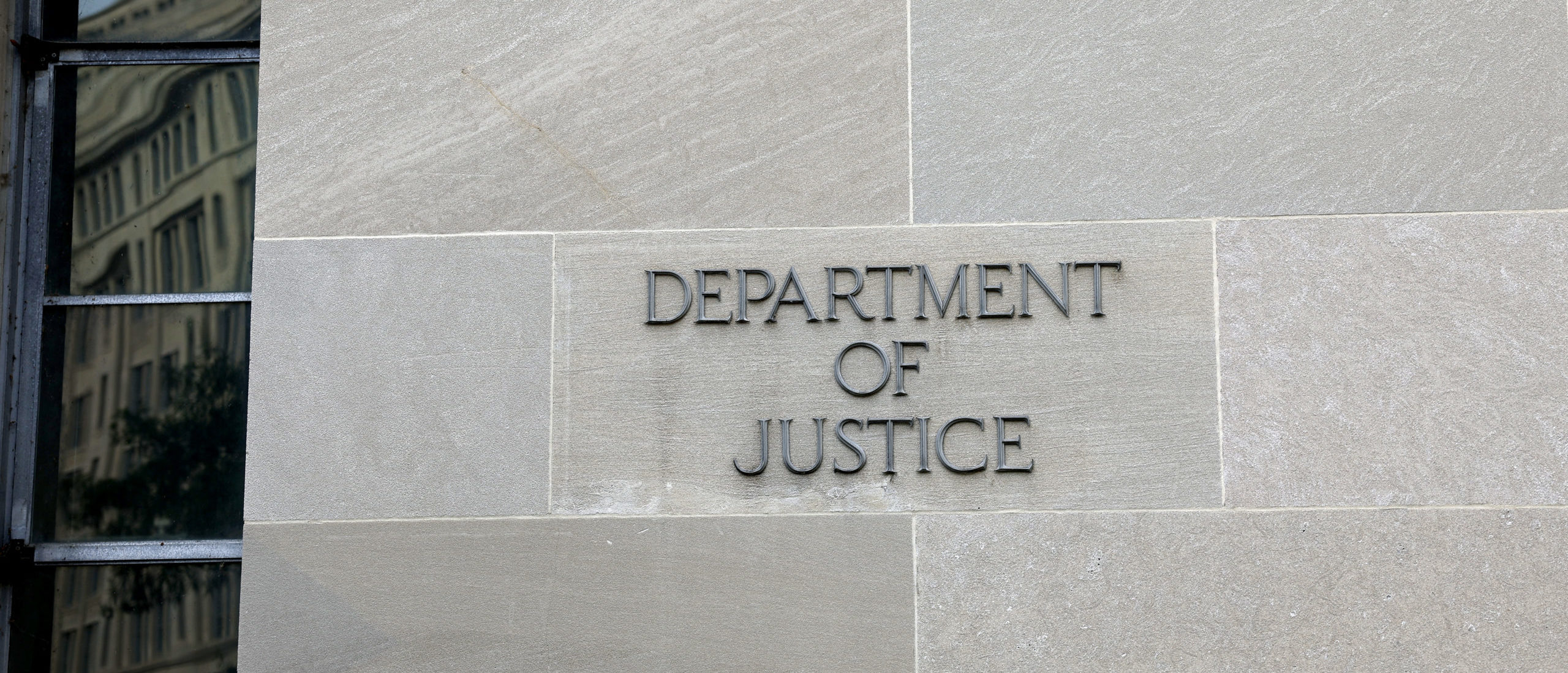 WASHINGTON, DC - JUNE 09: The U.S. Department of Justice is seen on June 09, 2023 in Washington, DC. Yesterday former U.S. President Donald Trump announced on his social media app Truth Social that he had been indicted for mishandling classified documents he kept upon leaving office and obstruction of evidence.