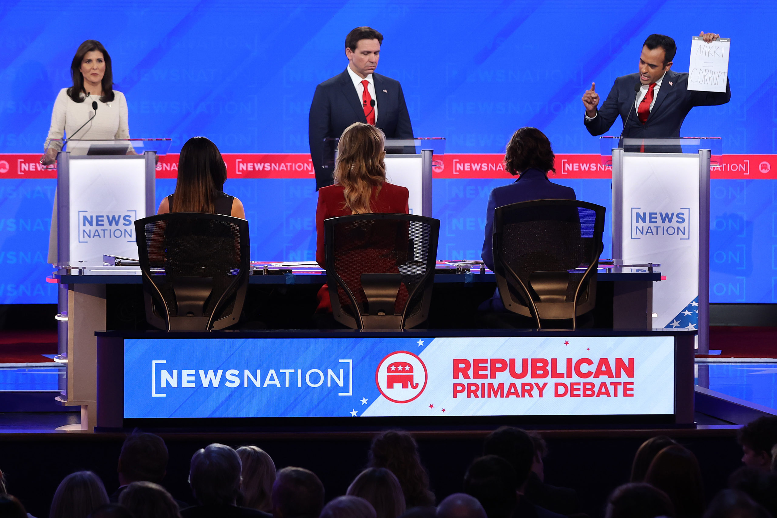 TUSCALOOSA, ALABAMA - DECEMBER 06: Republican presidential candidates (L-R) former U.N. Ambassador Nikki Haley, Florida Gov. Ron DeSantis and Vivek Ramaswamy participate in the NewsNation Republican Presidential Primary Debate at the University of Alabama Moody Music Hall on December 6, 2023 in Tuscaloosa, Alabama. The four presidential hopefuls squared off during the fourth Republican primary debate without current frontrunner and former U.S. President Donald Trump, who has declined to participate in any of the previous debates. (Photo by Justin Sullivan/Getty Images)