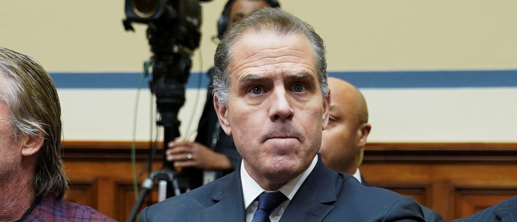 Hunter Biden, son of U.S. President Joe Biden, is seen as he makes a surprise appearance at a House Oversight Committee markup and meeting to vote on whether to hold Biden in contempt of Congress for failing to respond to a request to testify to the House last month, on Capitol Hill in Washington, U.S., January 10, 2024. REUTERS/Kevin Lamarque