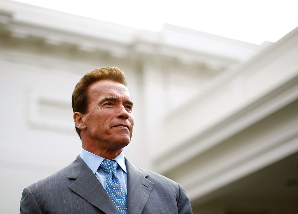 WASHINGTON - MARCH 20: California Governor Arnold Schwarzenegger looks on during a brief press conference outside the White House March 20, 2009 in Washington, DC. Earlier, Schwarzenegger, Pennsylvania Ed Rendell and New York City Mayor Michael Bloomberg met with President Obama in the Roosevelt Room to discuss the importance of investing in America�s transportation infrastructure. (Photo by Win McNamee/Getty Images)
