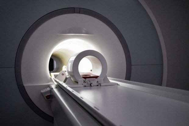 This photograph taken on October 5, 2021, shows a magnetic resonance imaging (MRI) machine at Neurospin in Gif-sur-Yvette, south-west of Paris. - This MRI is the most powerful in the world to observe the human body and more particularly the brain. Iseult is the result of a 20-year Franco-German project. The Magnetic Resonance Imaging (MRI) machine is out of the ordinary a power of 11,7 Tesla, that is 230 000 times the one of the earth magnetic field. (Photo by Alain JOCARD / AFP) (Photo by ALAIN JOCARD/AFP via Getty Images)