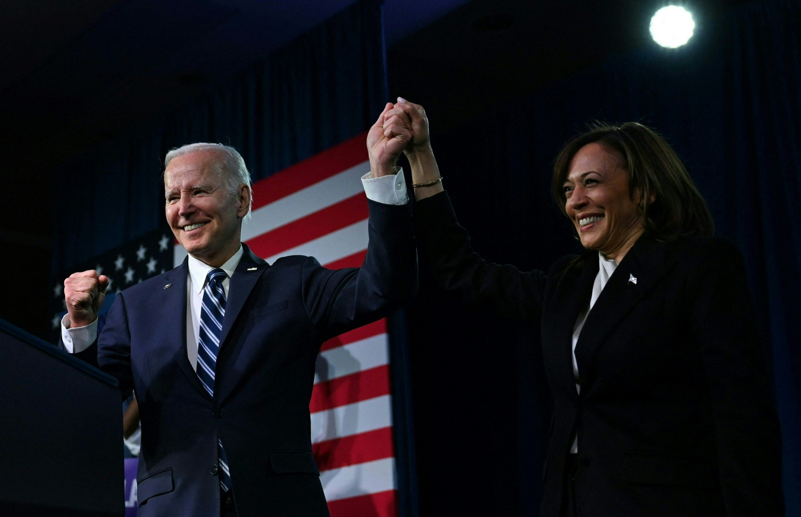 US Vice President Kamala Harris and US President Joe Biden hold hands at the Democratic National Committee (DNC) 2023 Winter meeting in Philadelphia, Pennsylvania, on February 3, 2023. - The DNC on February 4, 2023, is expected to approve a new lineup for the partys presidential primaries. (Photo by ANDREW CABALLERO-REYNOLDS / AFP) (Photo by ANDREW CABALLERO-REYNOLDS/AFP via Getty Images) 