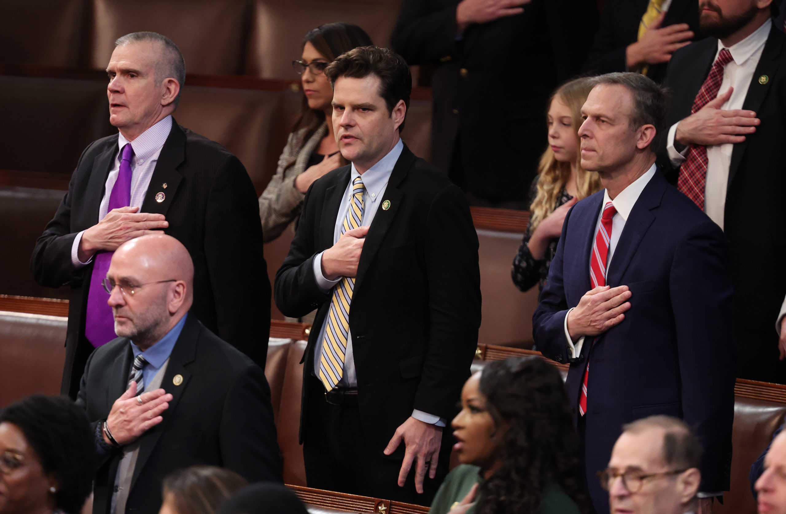 WASHINGTON, DC - JANUARY 05: (L-R) U.S. Rep.-elect Matt Rosendale (R-MT), Rep.-elect Matt Gaetz (R-FL), Rep.-elect Scott Perry (R-PA) recite the Pledge of Allegiance in the House Chamber during the third day of elections for Speaker of the House at the U.S. Capitol Building on January 05, 2023 in Washington, DC. The House of Representatives is meeting to vote for the next Speaker after House Republican Leader Kevin McCarthy (R-CA) failed to earn more than 218 votes on several ballots, the first time in 100 years that the Speaker was not elected on the first ballot. (Photo by Win McNamee/Getty Images)
