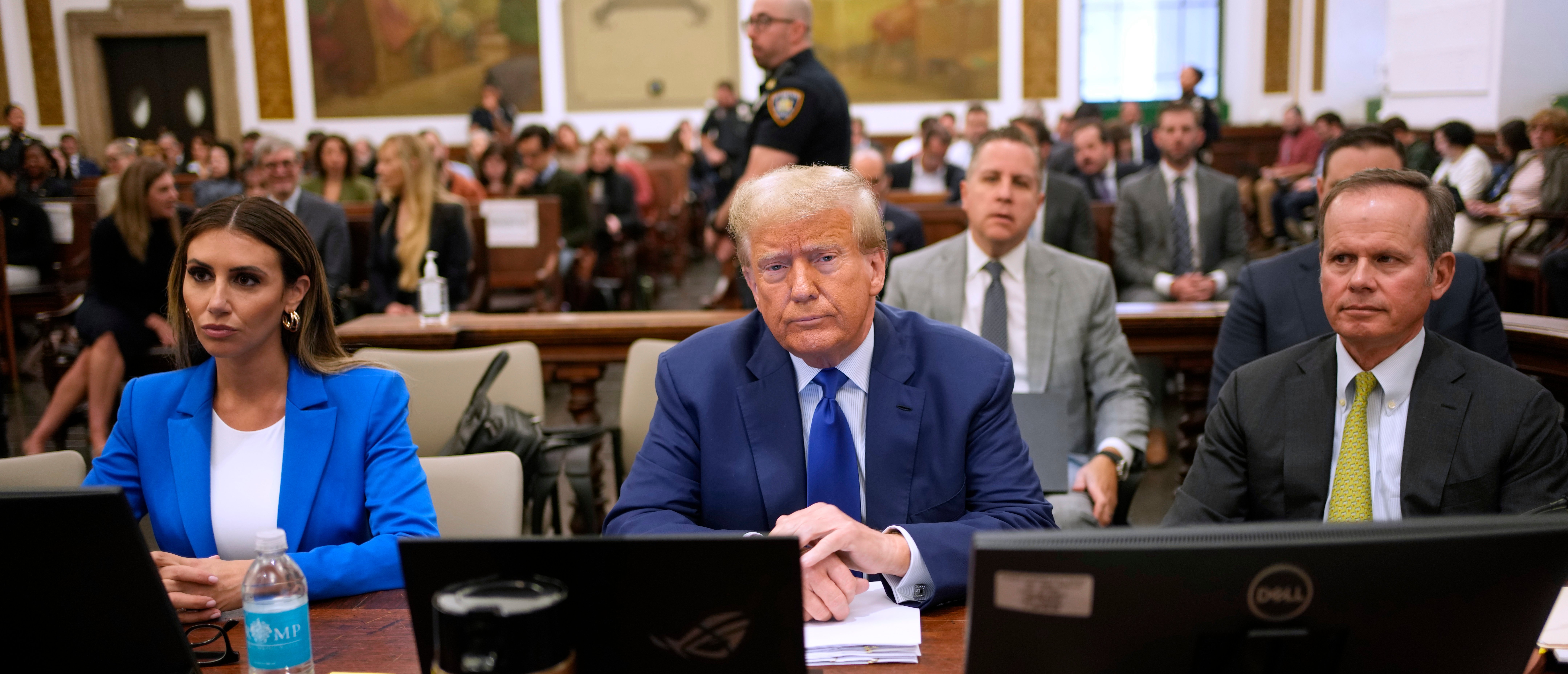 NEW YORK, NEW YORK - OCTOBER 25: Former President Donald Trump sits in court with attorneys Alina Habba and Christopher Kise during his civil fraud trial at New York State Supreme Court on October 25, 2023 in New York City. The former president may be forced to sell off his properties after Justice Arthur Engoron canceled his business certificates and ruled that he committed fraud for years while building his real estate empire after being sued by Attorney General Letitia James, seeking $250 million in damages. The trial will determine how much he and his companies will be penalized for the fraud. (Photo by Seth Wenig-Pool/Getty Images)
