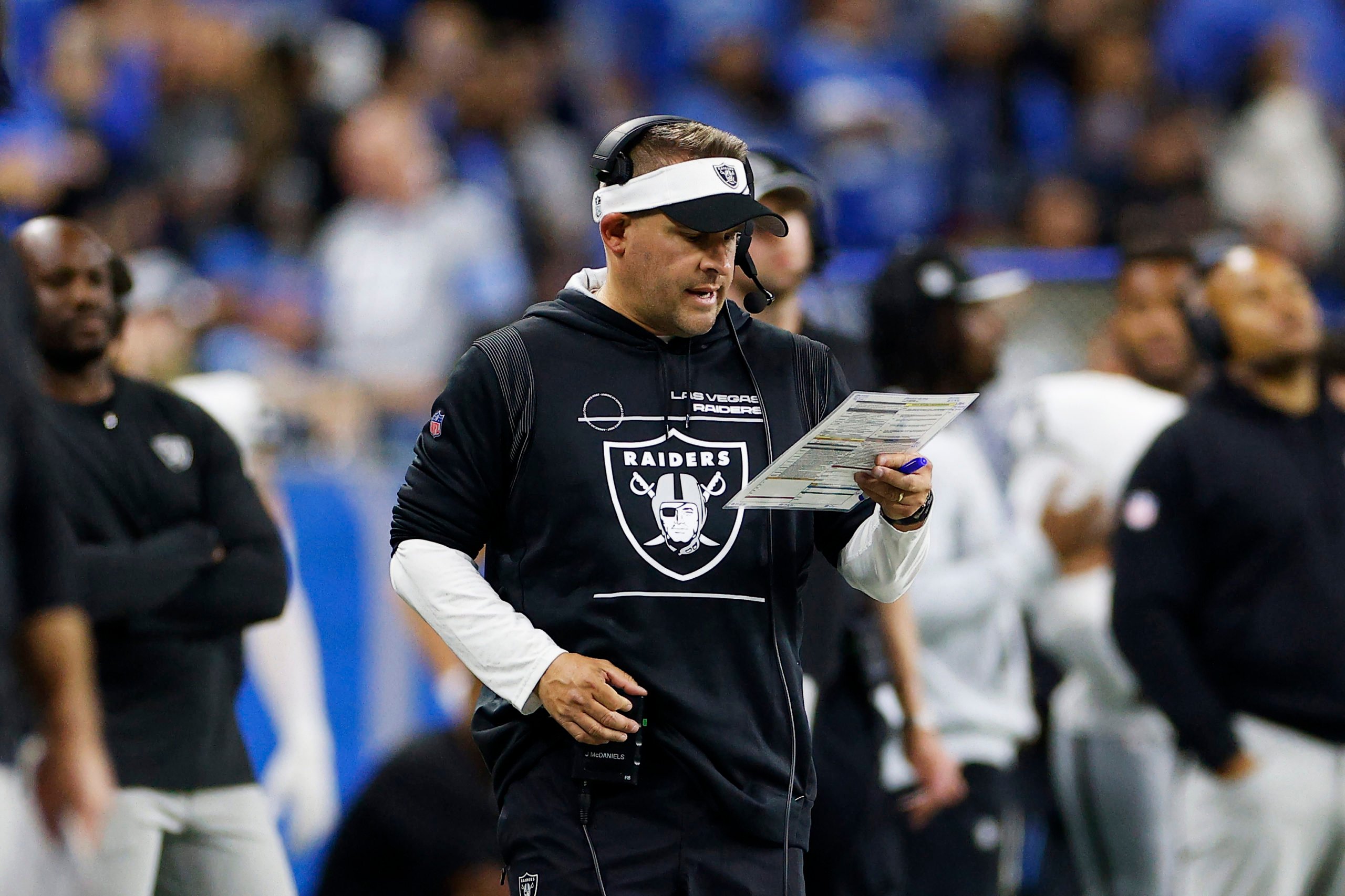 DETROIT, MICHIGAN - OCTOBER 30: Head coach Josh McDaniels of the Las Vegas Raiders looks on in the fourth quarter against the Detroit Lions at Ford Field on October 30, 2023 in Detroit, Michigan. Mike Mulholland/Getty Images