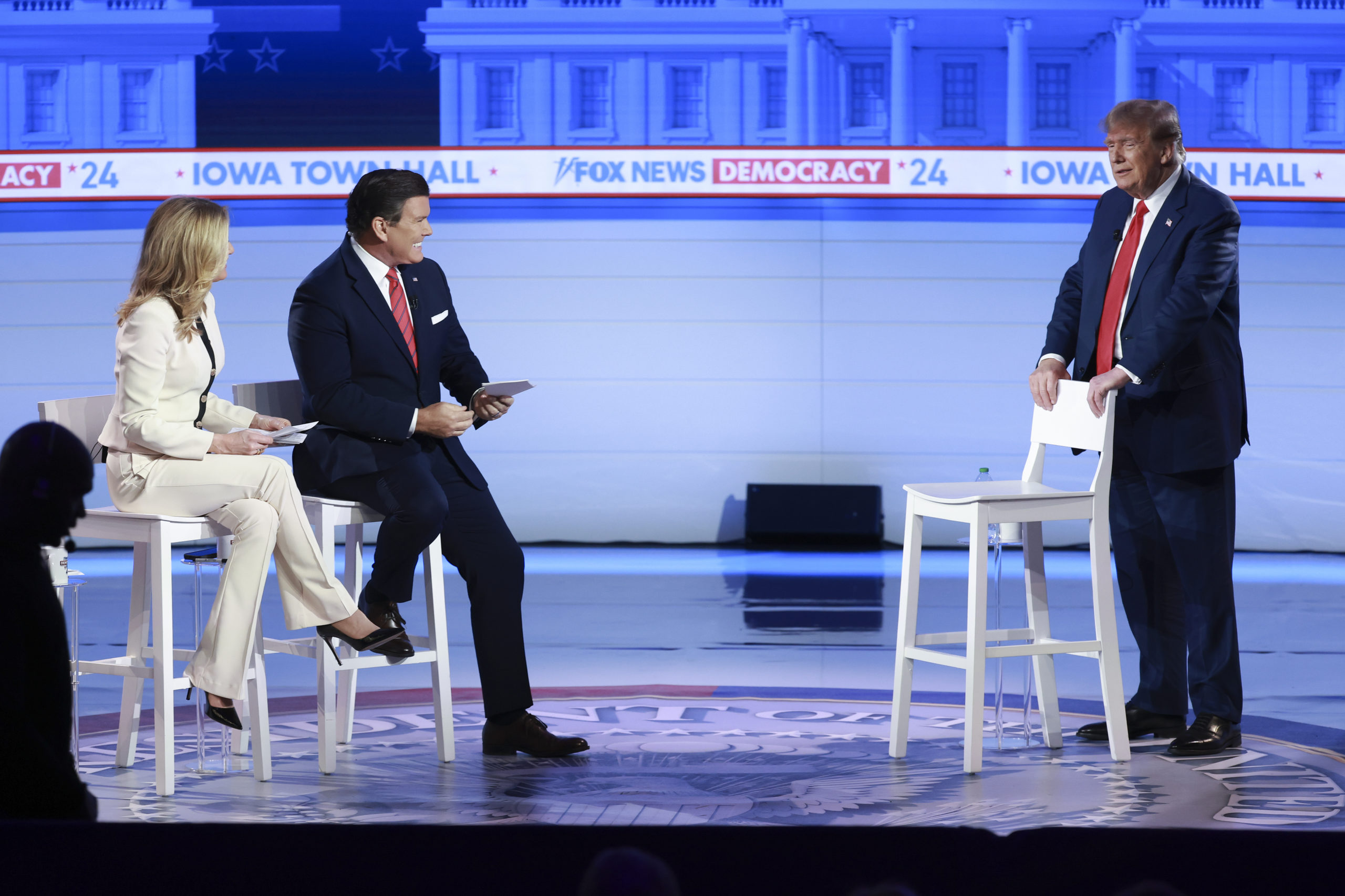 Moderators Martha MacCallum and Bret Baier host a Fox News Town Hall with Republican presidential candidate former President Donald Trump on January 10, 2024 in Des Moines, Iowa. Trump declined to participate in a debate featuring fellow Republican presidential candidates former U.N. Ambassador Nikki Haley and Florida Governor Ron DeSantis also taking place this evening. (Photo by Joe Raedle/Getty Images)