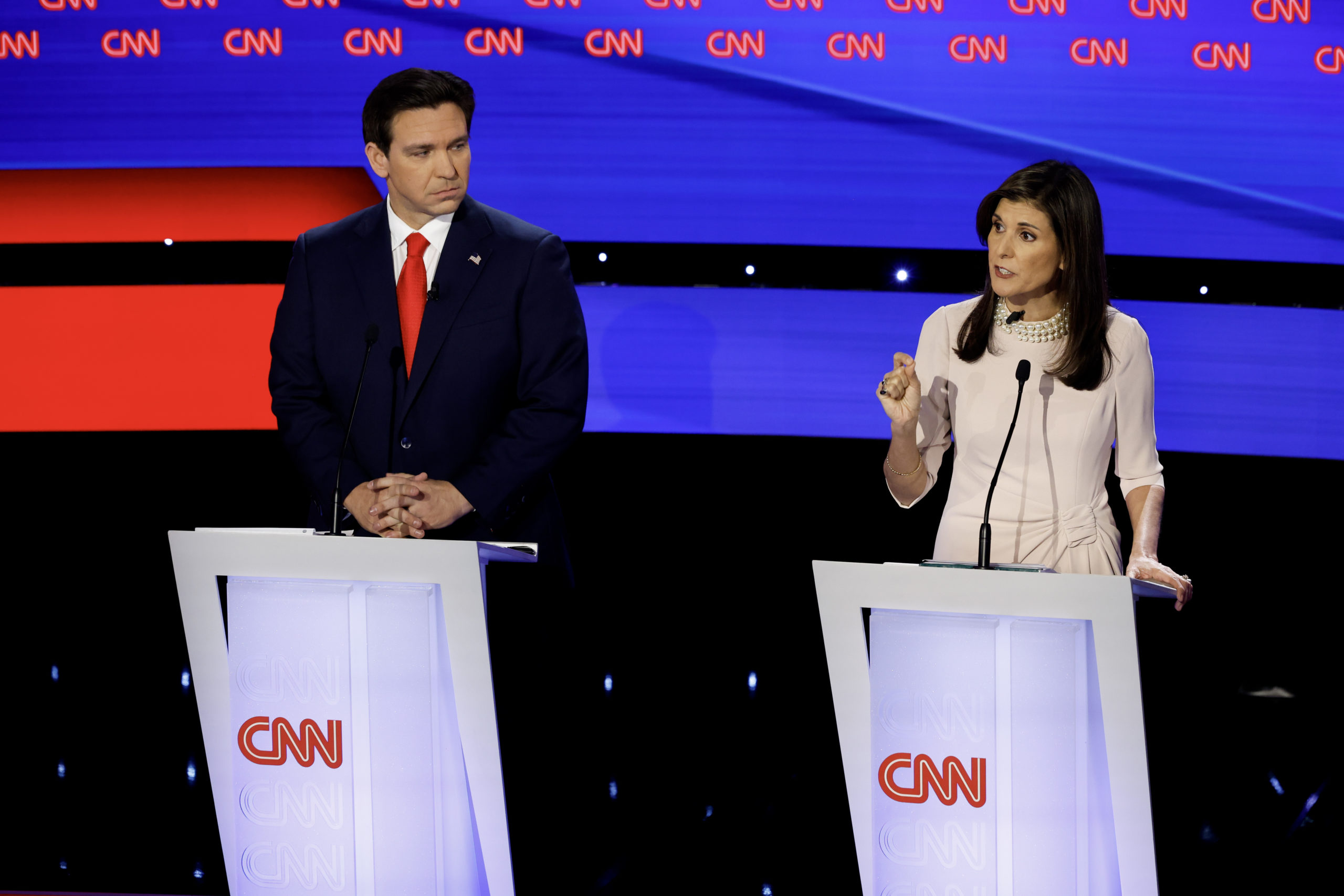DES MOINES, IOWA - JANUARY 10: Republican presidential candidates Florida Gov. Ron DeSantis and former U.N. Ambassador Nikki Haley participate in the CNN Republican Presidential Primary Debate in Sheslow Auditorium at Drake University on January 10, 2024 in Des Moines, Iowa. DeSantis and Haley both qualified for this final debate before the Iowa caucuses, while former President Donald Trump declined to participate and instead held a simultaneous town hall event live on FOX News. (Photo by Chip Somodevilla/Getty Images)