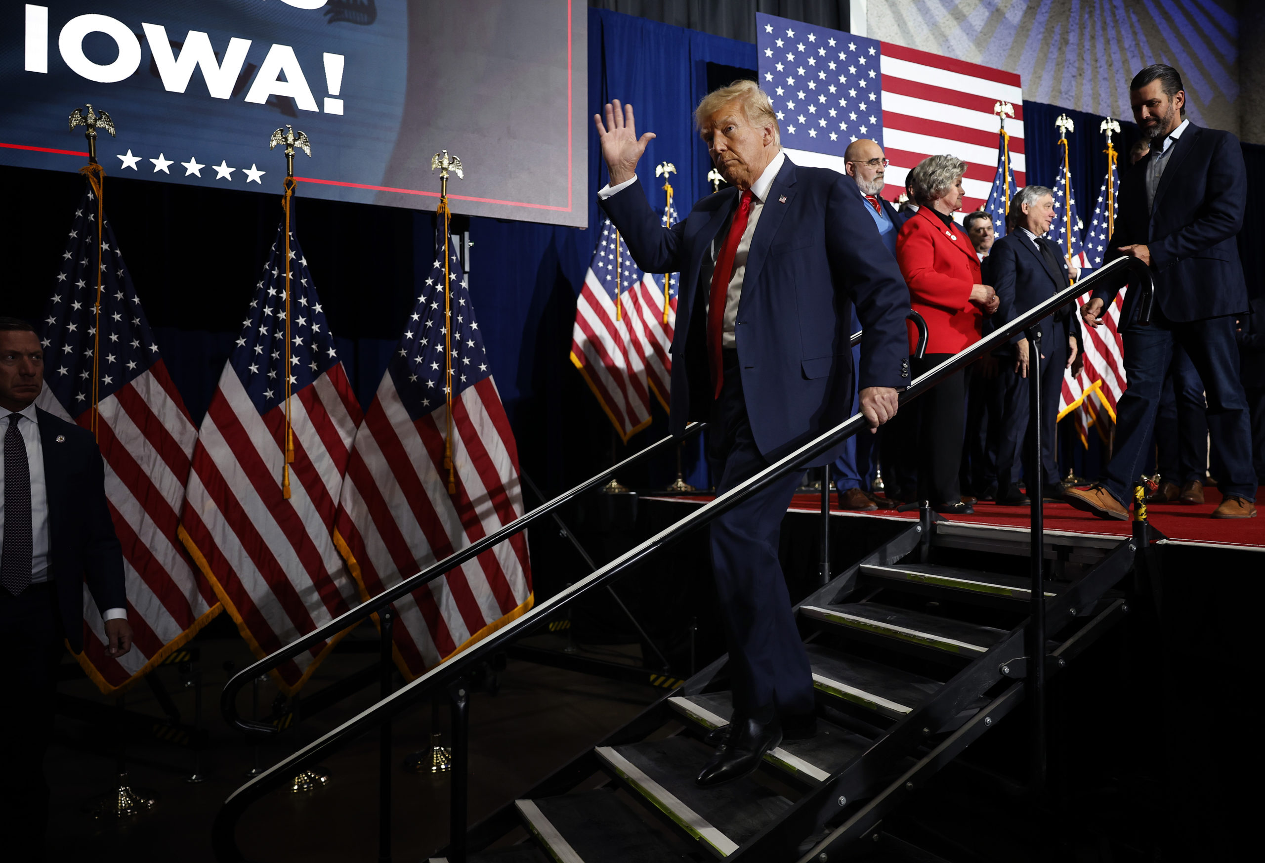 DES MOINES, IOWA - JANUARY 15: Republican presidential candidate, former U.S. President Donald Trump acknowledges supporters during his caucus night event at the Iowa Events Center on January 15, 2024 in Des Moines, Iowa. Iowans voted today in the state’s caucuses for the first contest in the 2024 Republican presidential nominating process. Trump has been projected winner of the Iowa caucus. (Photo by Chip Somodevilla/Getty Images)