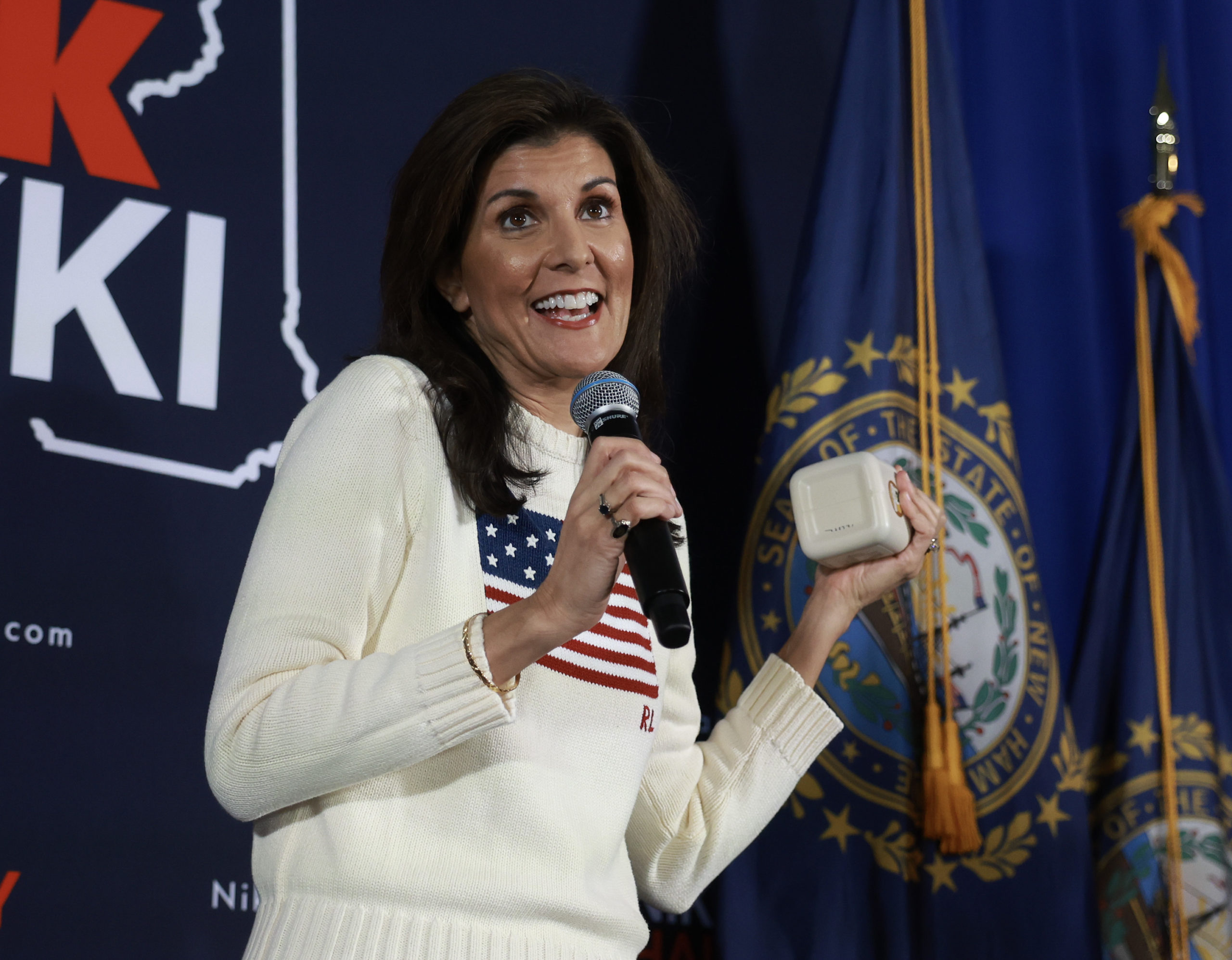 KEENE, NEW HAMPSHIRE - JANUARY 20: Republican presidential candidate, former U.N. Ambassador Nikki Haley, holds a bottle of maple syrup given to her by former Keene Mayor George Hansel at a campaign event held in the Keene Country Club on January 20, 2024 in Keene, New Hampshire. Haley continues to campaign across the state. (Photo by Joe Raedle/Getty Images)