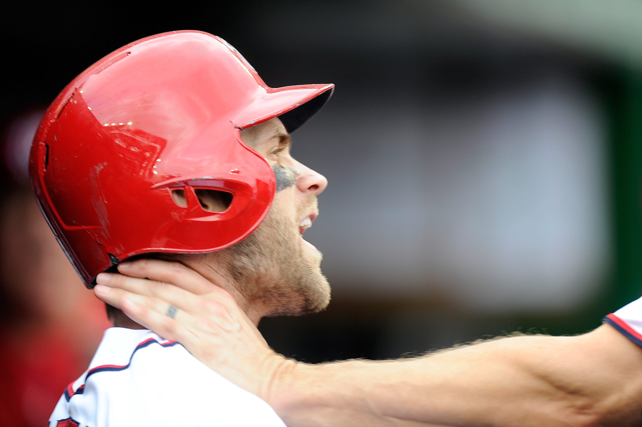 WASHINGTON, DC - SEPTEMBER 27: Bryce Harper #34 of the Washington Nationals is grabbed by Jonathan Papelbon #58 in the eighth inning against the Philadelphia Phillies at Nationals Park on September 27, 2015 in Washington, DC. Greg Fiume/Getty Images