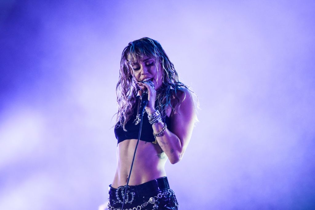 TOPSHOT - US singer Miley Cyrus performs on stage during a concert at the Sunny Hill Festival in Pristina on August 2, 2019. (Photo by Armend NIMANI / AFP) (Photo by ARMEND NIMANI/AFP via Getty Images)