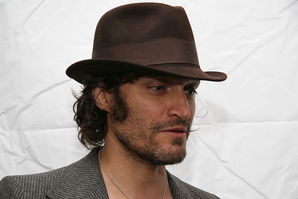 NEW YORK - SEPTEMBER 13: Director Vincent Gallo poses in the W VIP lounge during Olympus Fashion Week in Bryant Park September 13, 2006 in New York City. (Photo by Astrid Stawiarz/Getty Images)
