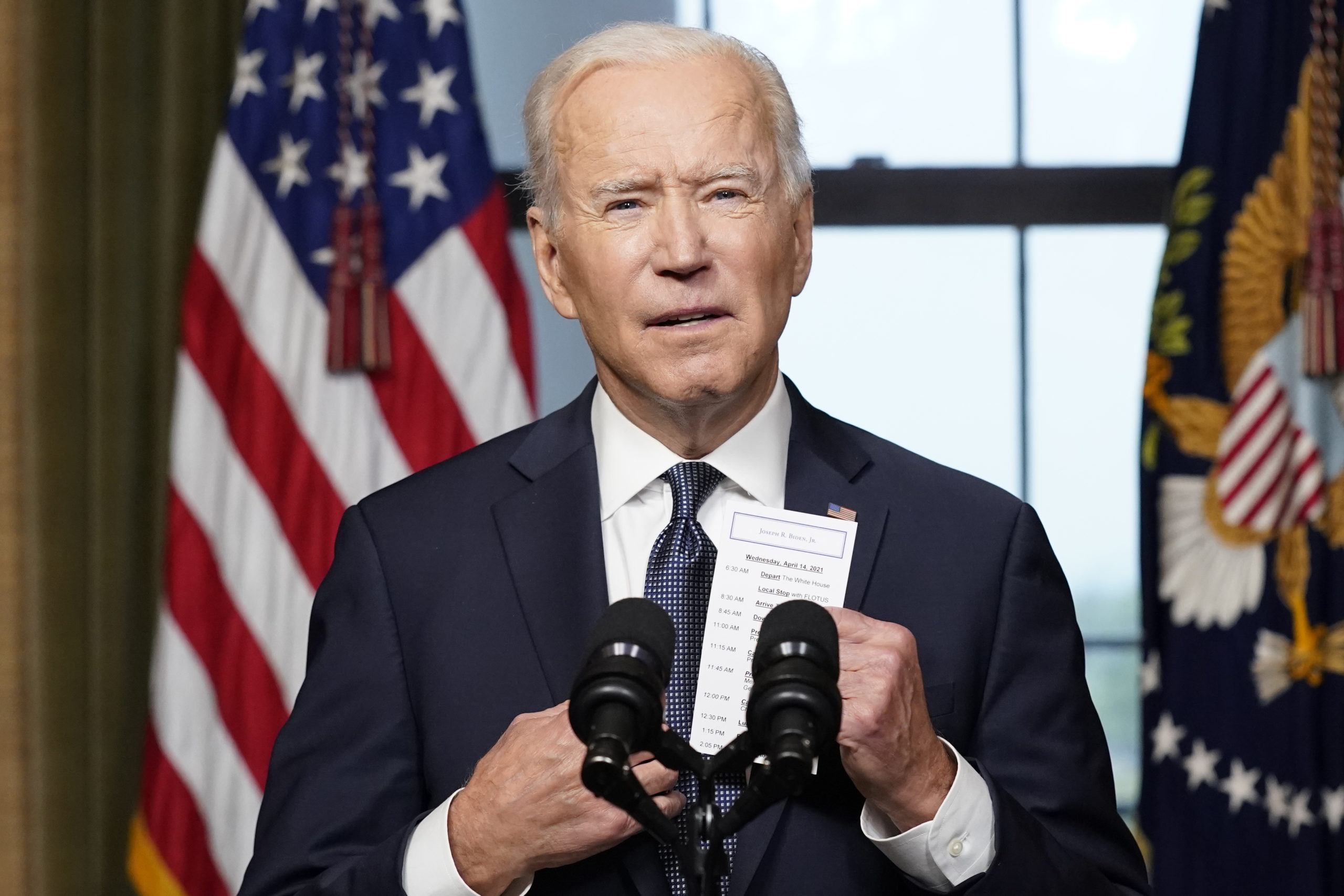 U.S. President Joe Biden pulls a note card from his pocket as he speaks from the Treaty Room in the White House about the withdrawal of U.S. troops from Afghanistan on April 14, 2021 in Washington, DC. President Biden announced his plans to pull all remaining U.S. troops out of Afghanistan by September 11, 2021 in a final step towards ending America’s longest war. (Photo by Andrew Harnik-Pool/Getty Images)
