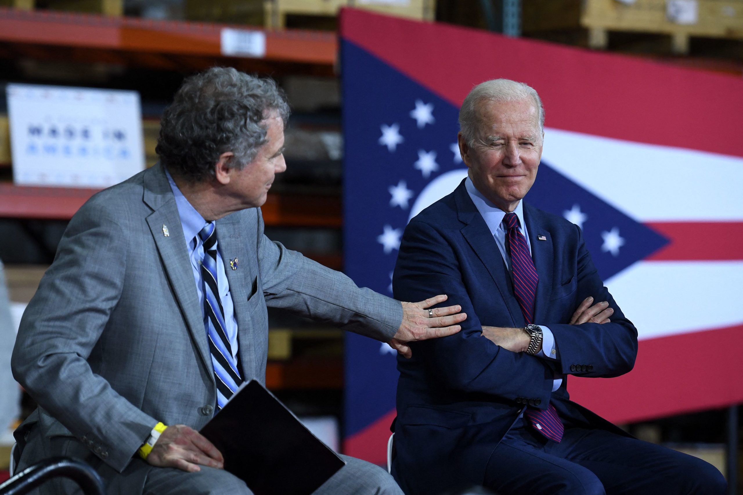 US Senator Sherrod Brown (D-OH) and US President Joe Biden (R) visit United Performance Metals, a specialty metals solutions center, in Hamilton, Ohio, on May 6, 2022. (Photo by OLIVIER DOULIERY / AFP) (Photo by OLIVIER DOULIERY/AFP via Getty Images)