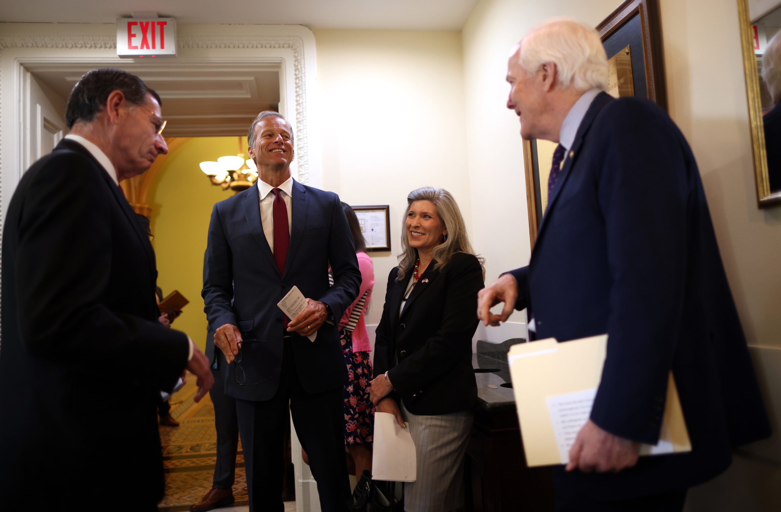 WASHINGTON, DC - AUGUST 04: (L-R) Sen. John Barasso (R-WY), Sen. John Thune (R-SD), Sen. Marsha Blackburn (R-TN) and Sen. John Cornyn (R-TX) talk prior to a press conference on a proposed Democratic tax plan, at the U.S. Capitol on August 04, 2021 in Washington, DC. The Senators spoke out on the tax proposal saying that it will hurt job growth and the middle class. (Photo by Kevin Dietsch/Getty Images)