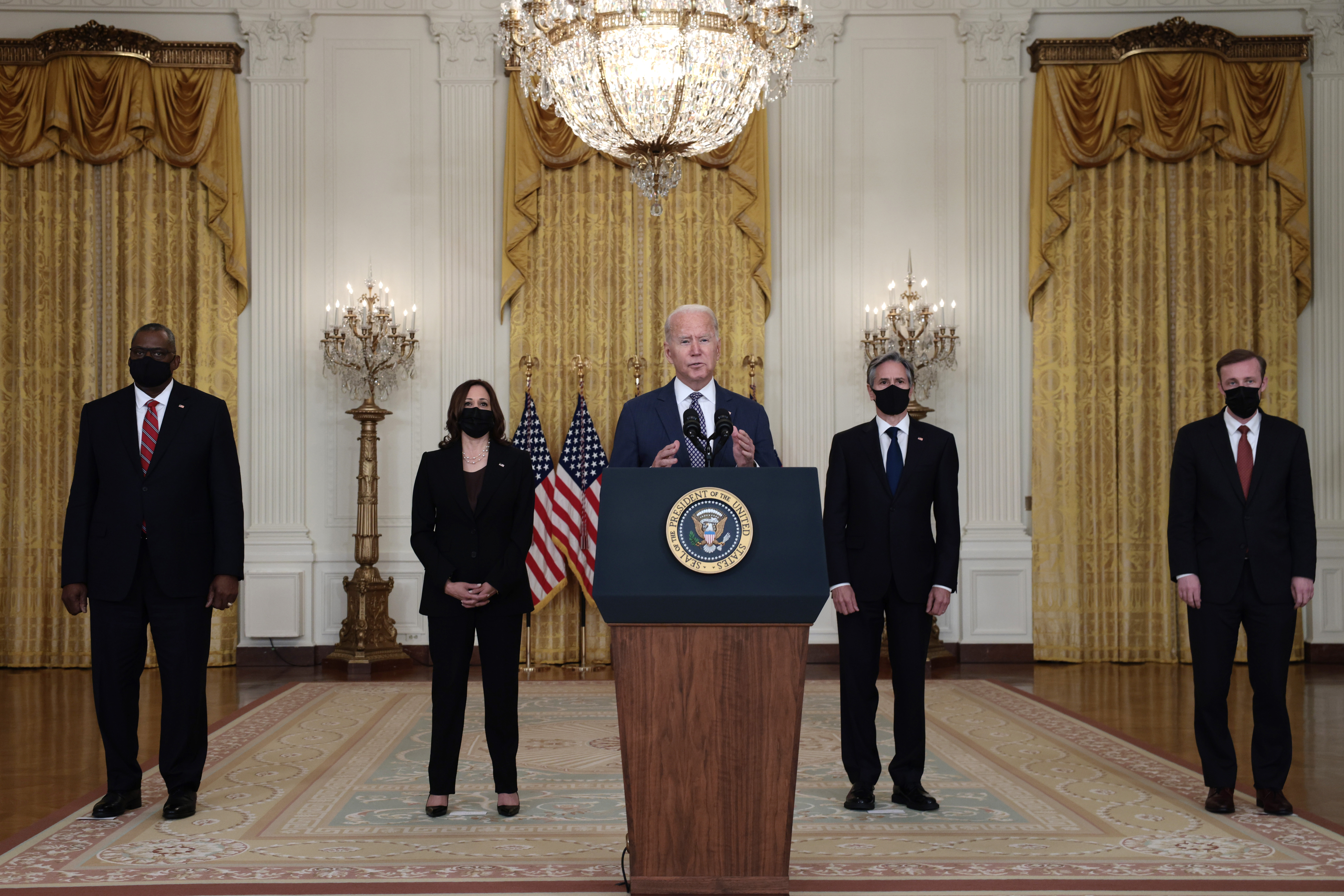 U.S. President Joe Biden delivers remarks on the U.S. military’s ongoing evacuation efforts in Afghanistan as he is joined by (L-R) U.S. Secretary of Defense Lloyd Austin, U.S. Vice President Kamala Harris, Secretary of State Antony Blinken, and White House National Security Advisor Jake Sullivan from the East Room of the White House on August 20, 2021 in Washington, DC. The White House announced earlier that the U.S. has evacuated almost 14,000 people from Afghanistan since the end of July. (Photo by Anna Moneymaker/Getty Images)