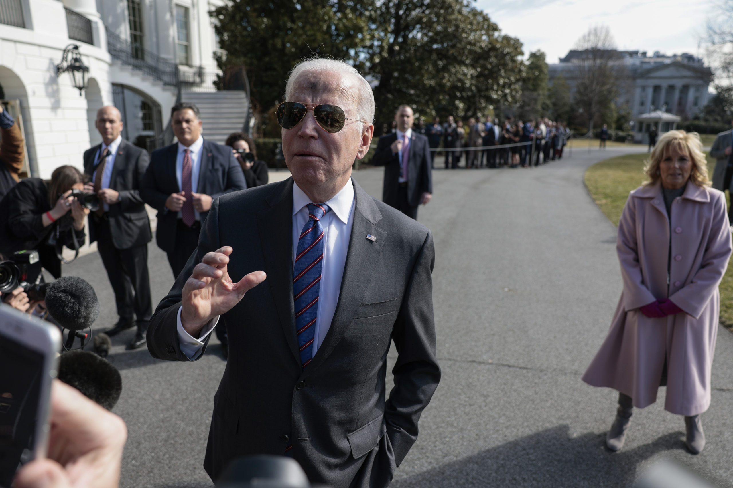 President Joe Biden, with ashes on his forehead in honor of Ash Wednesday, speaks to reporters before boarding Marine One with First Lady Jill Biden on the South Lawn of the White House on March 02, 2022 in Washington, DC. The Bidens are spending the day in Superior, Wisconsin, with cabinet members where they will give remarks on the bipartisan infrastructure legislation. (Photo by Anna Moneymaker/Getty Images)