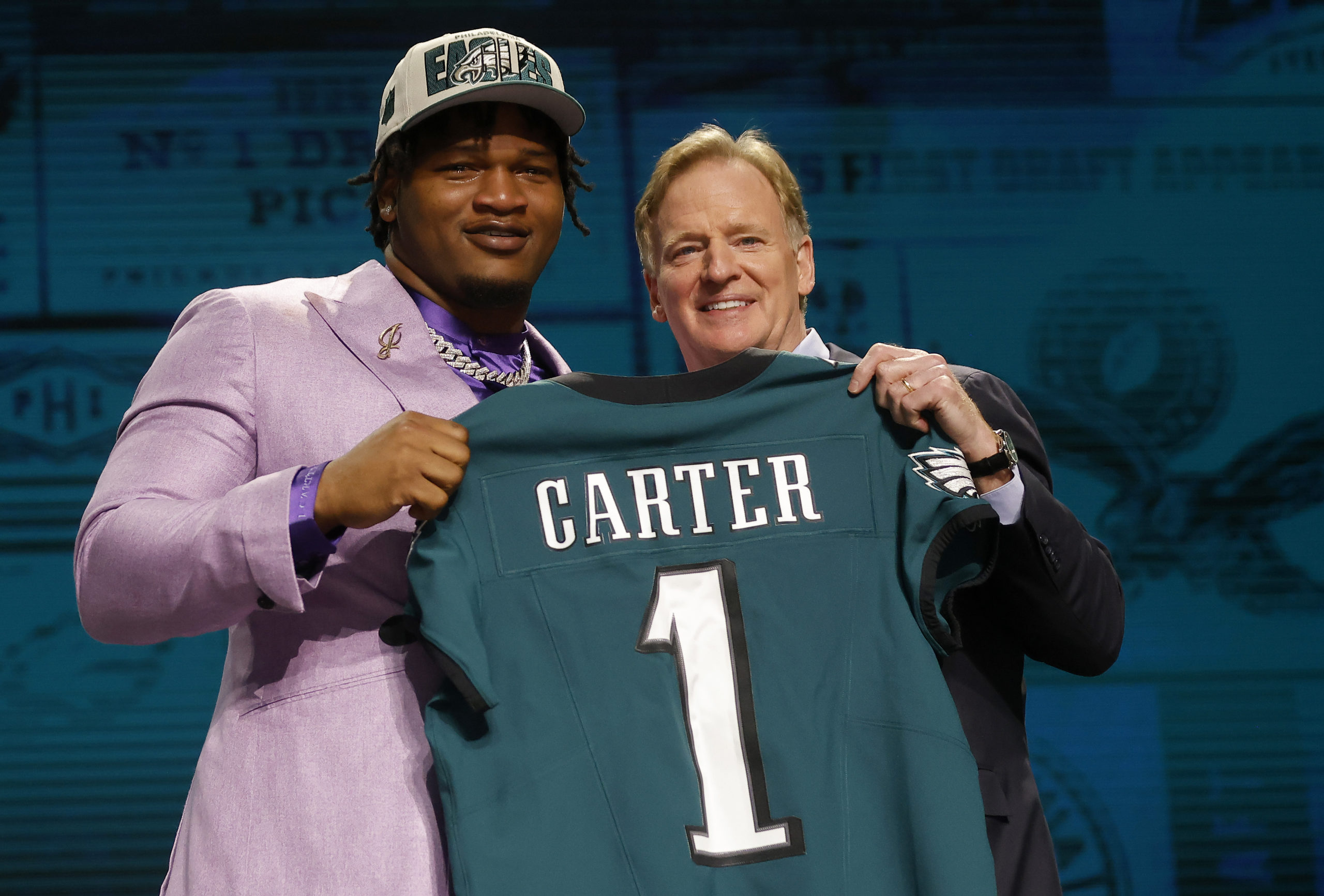 KANSAS CITY, MISSOURI - APRIL 27: (L-R) Jalen Carter poses with NFL Commissioner Roger Goodell after being selected ninth overall by the Philadelphia Eagles during the first round of the 2023 NFL Draft at Union Station on April 27, 2023 in Kansas City, Missouri. David Eulitt/Getty Images