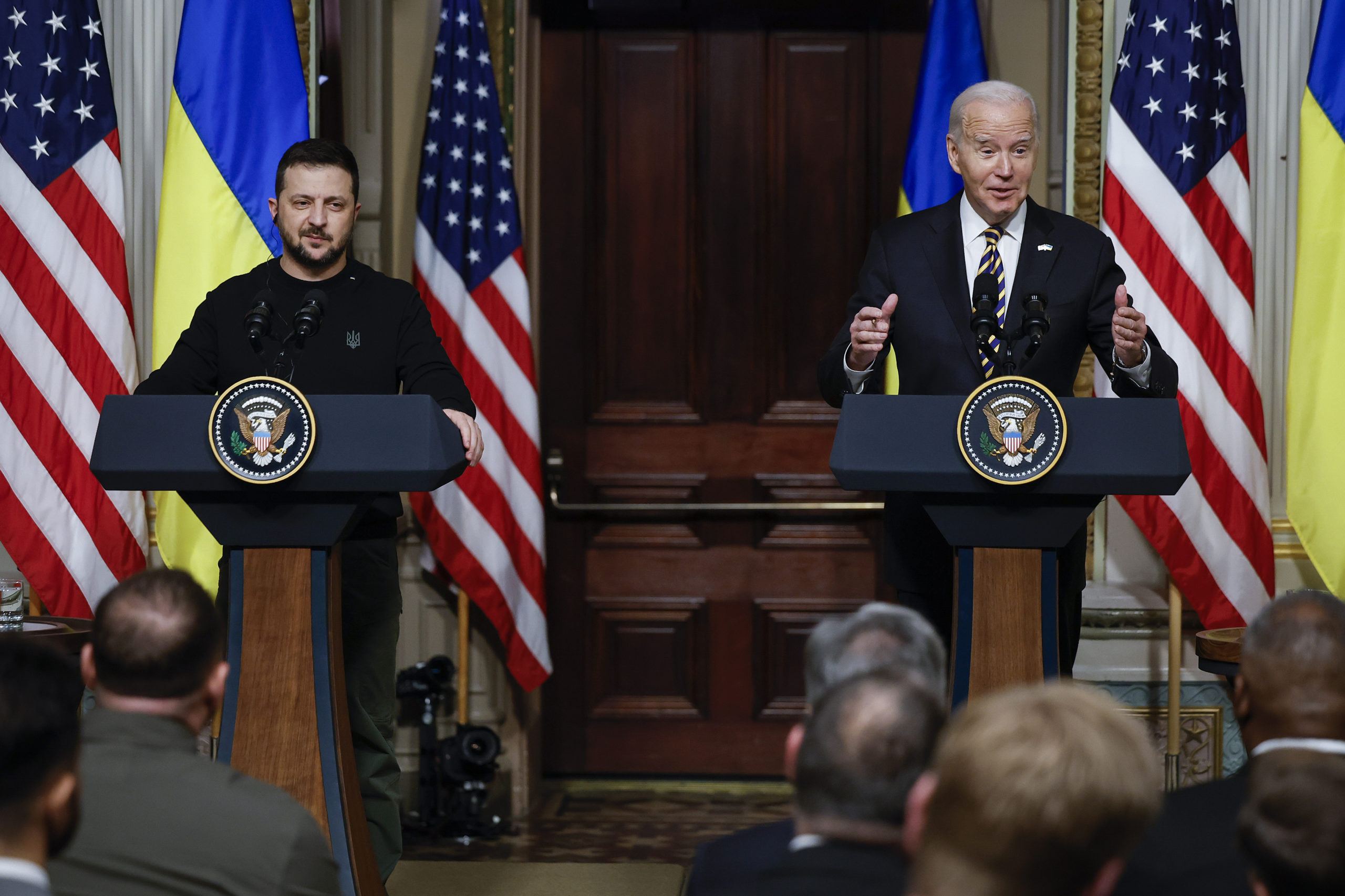 Ukrainian President Volodymyr Zelensky (L) and U.S. President Joe Biden hold a news conference in the Indian Treaty Room of the Eisenhower Executive Office Building on December 12, 2023 in Washington, DC. Zelensky is in Washington meeting with Biden and Congressional leaders to make an in-person case for continued military aid as Ukraine runs out of money for their war against Russia. The meetings come days after the U.S. Senate failed to advance Biden's proposed national security package that included emergency aid to Ukraine and Israel. (Photo by Chip Somodevilla/Getty Images)