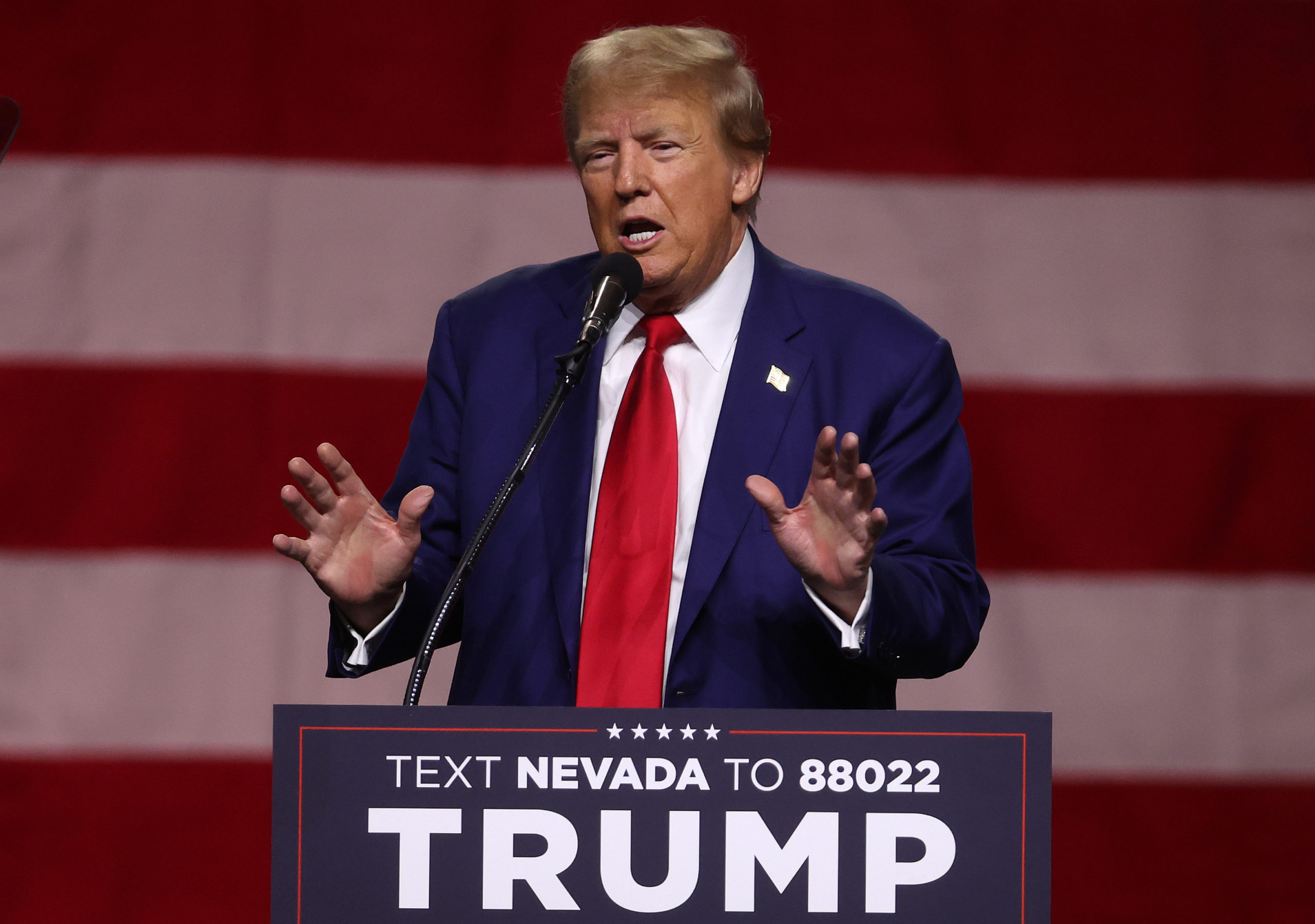 RENO, NEVADA - DECEMBER 17: Republican Presidential candidate former U.S. President Donald Trump delivers remarks during a campaign rally at the Reno-Sparks Convention Center on December 17, 2023 in Reno, Nevada. Former U.S. President Trump held a campaign rally as he battles to become the Republican Presidential nominee for the 2024 Presidential election. (Photo by Justin Sullivan/Getty Images)