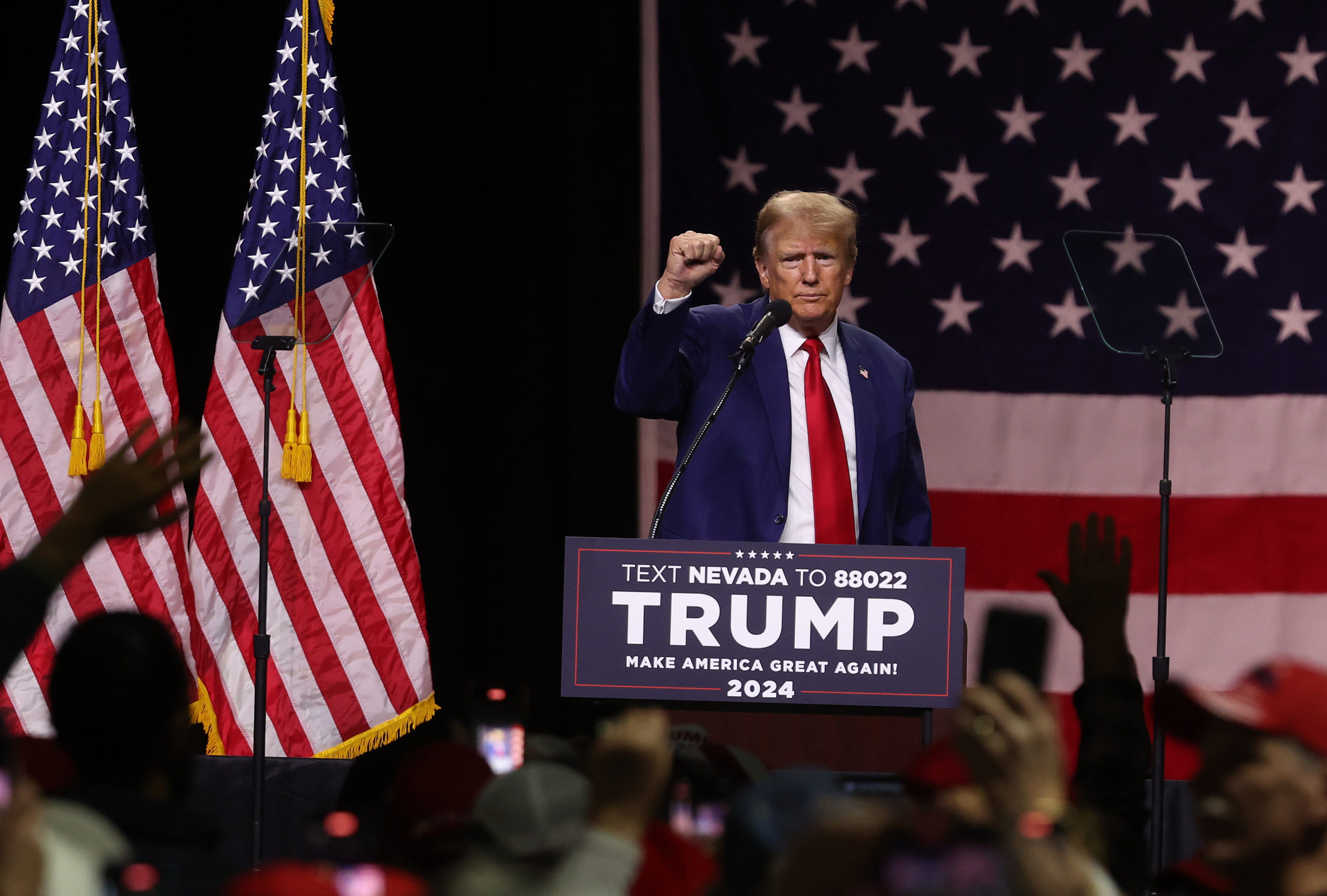RENO, NEVADA - DECEMBER 17: Republican Presidential candidate former U.S. President Donald Trump gestures during a campaign rally at the Reno-Sparks Convention Center on December 17, 2023 in Reno, Nevada. Former U.S. President Trump held a campaign rally as he battles to become the Republican Presidential nominee for the 2024 Presidential election. (Photo by Justin Sullivan/Getty Images)