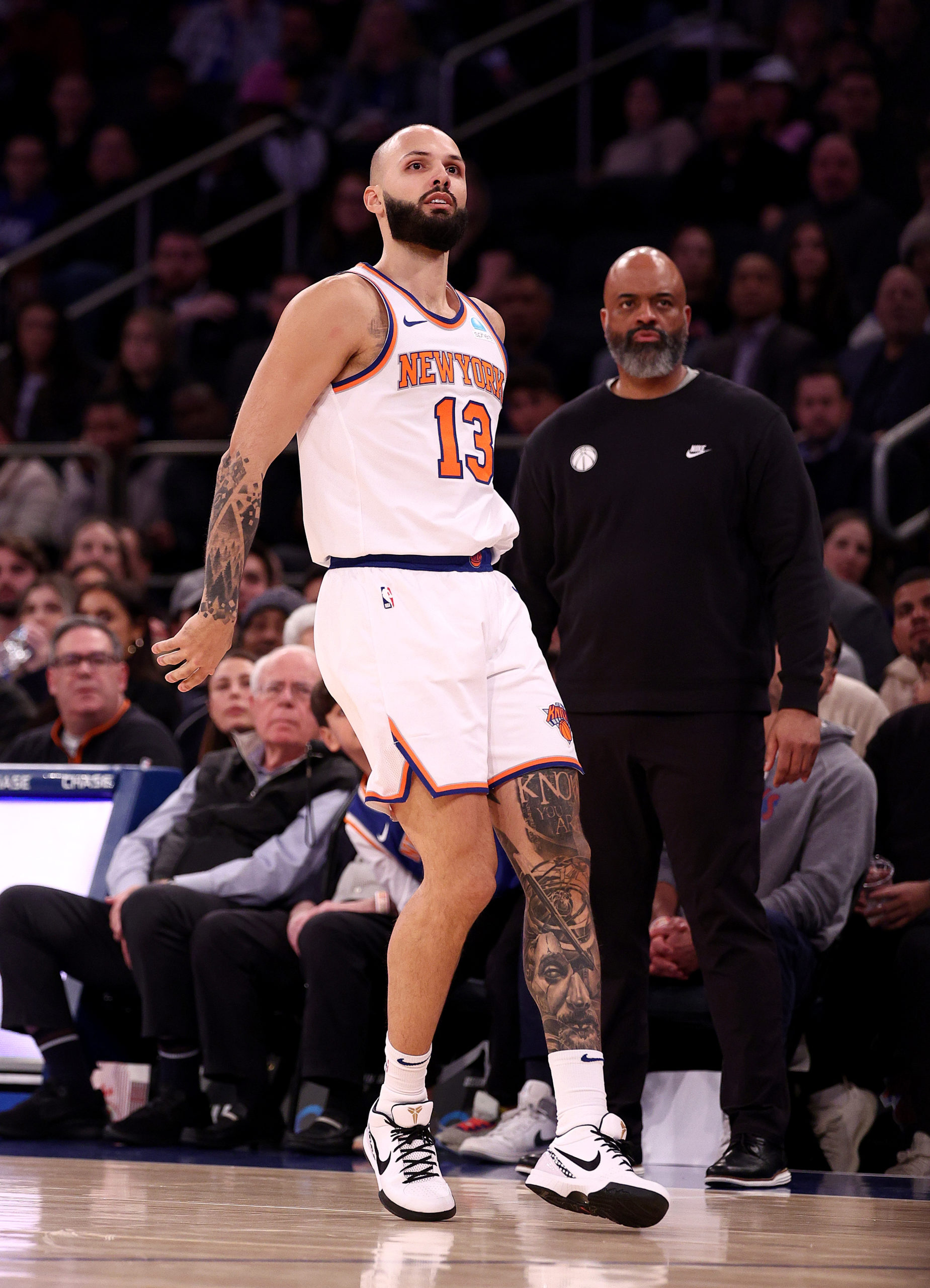 NEW YORK, NEW YORK - JANUARY 18: Evan Fournier #13 of the New York Knicks watches his shot in the first half against the Washington Wizards at Madison Square Garden on January 18, 2024 in New York City. Elsa/Getty Images