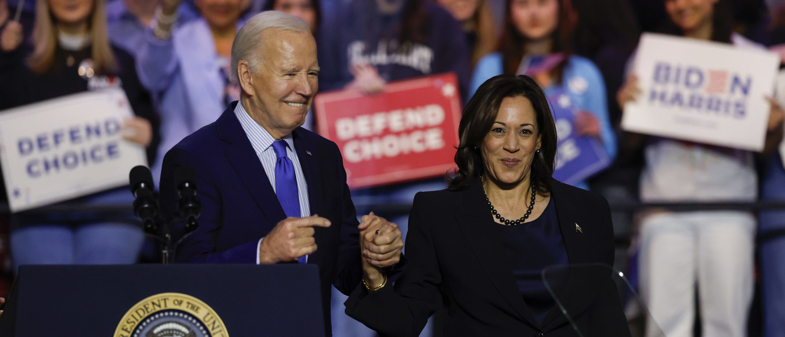 U.S. President Joe Biden and U.S. Vice President Kamala Harris stand onstage and wave to the crowd at a ”Reproductive Freedom Campaign Rally" at George Mason University on January 23, 2024 in Manassas, Virginia. During the first joint rally held by the President and Vice President, Biden and Harris spoke on what they perceive as a threat to reproductive rights. (Photo by Anna Moneymaker/Getty Images)