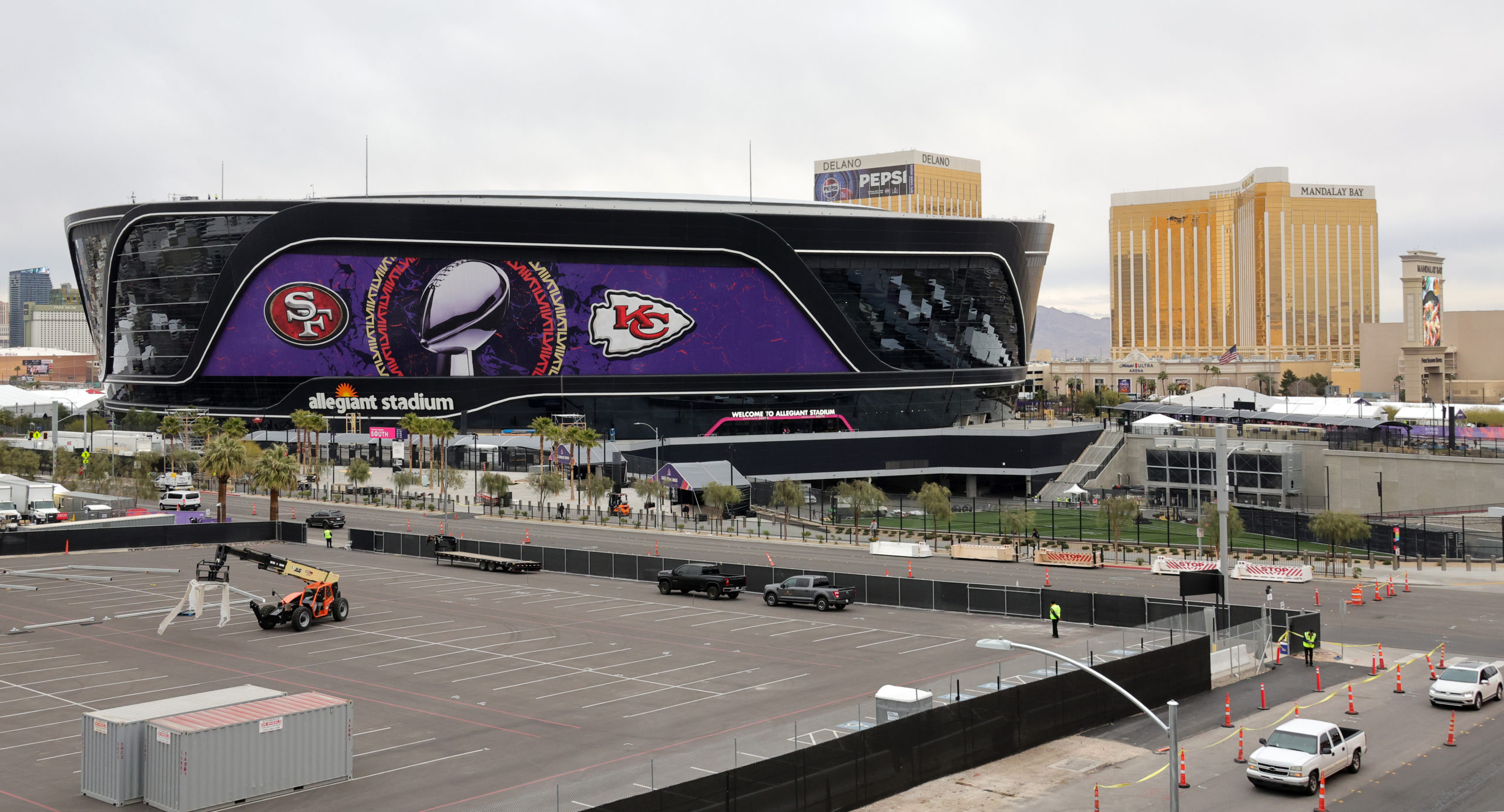 LAS VEGAS, NEVADA - FEBRUARY 01: An exterior view shows an image of the Lombardi Trophy, team logos and signage for Super Bowl LVIII at Allegiant Stadium on February 01, 2024 in Las Vegas, Nevada. The game will be played on February 11, 2024, between the Kansas City Chiefs and the San Francisco 49ers. Ethan Miller/Getty Images