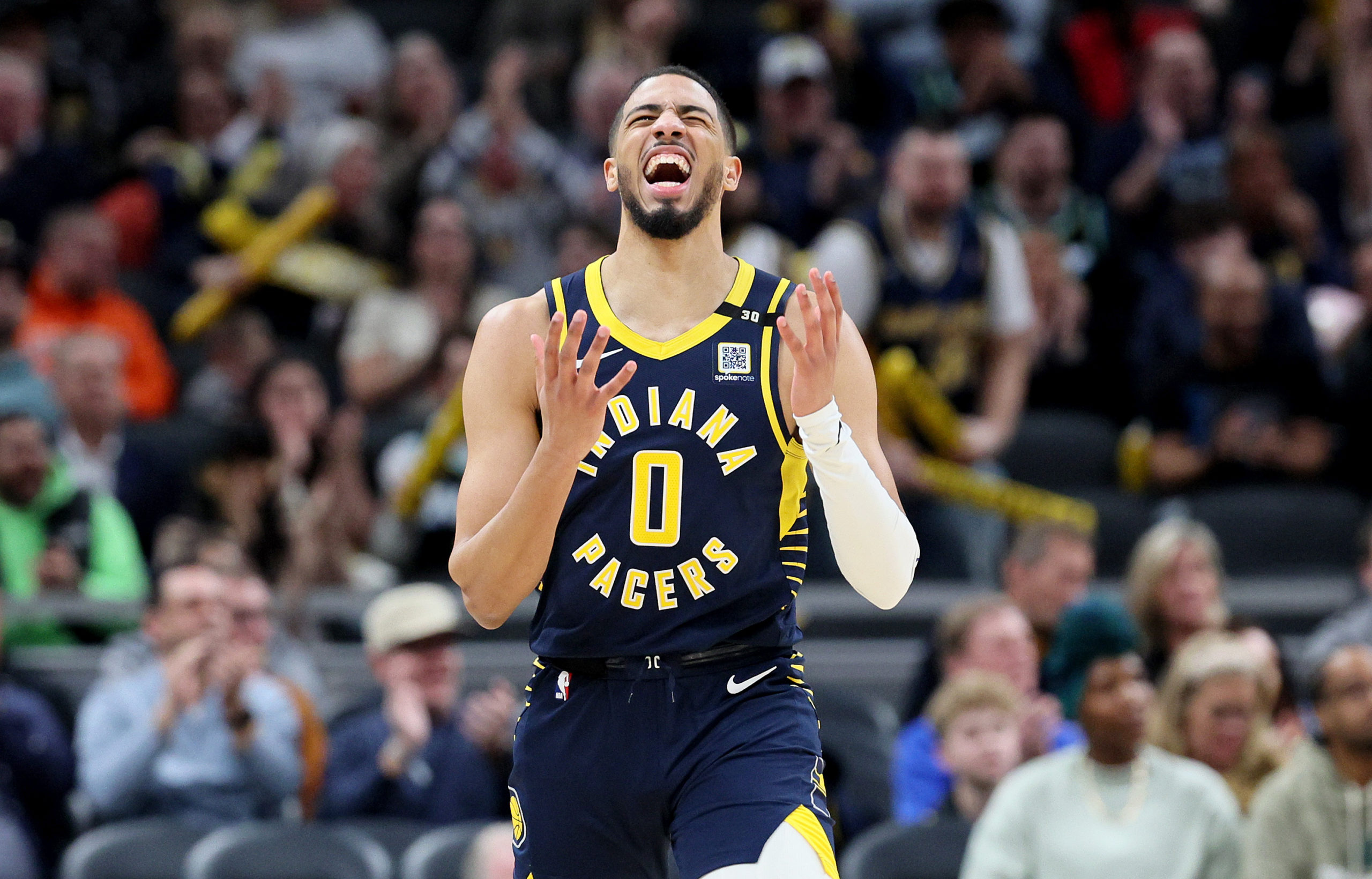 INDIANAPOLIS, INDIANA - FEBRUARY 06: Tyrese Haliburton #0 of the Indiana Pacers celebrates in the second half of the 132-129 win over the Houston Rockets at Gainbridge Fieldhouse on February 06, 2024 in Indianapolis, Indiana. Andy Lyons/Getty Images
