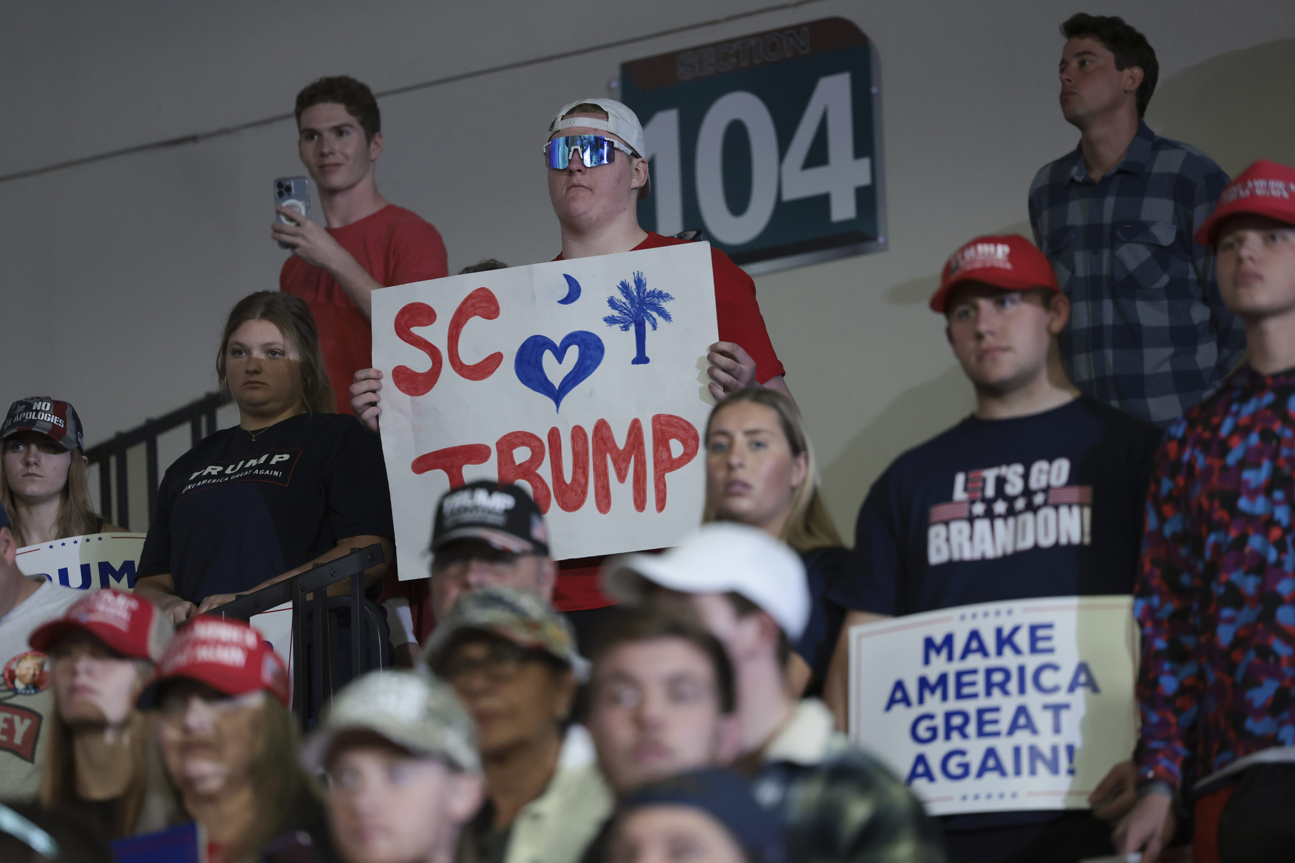 CONWAY, SOUTH CAROLINA - FEBRUARY 10: Supporters of Republican presidential candidate and former President Donald Trump listen while he speaks during a Get Out The Vote rally at Coastal Carolina University on February 10, 2024 in Conway, South Carolina. South Carolina holds its Republican primary on February 24. (Photo by Win McNamee/Getty Images)