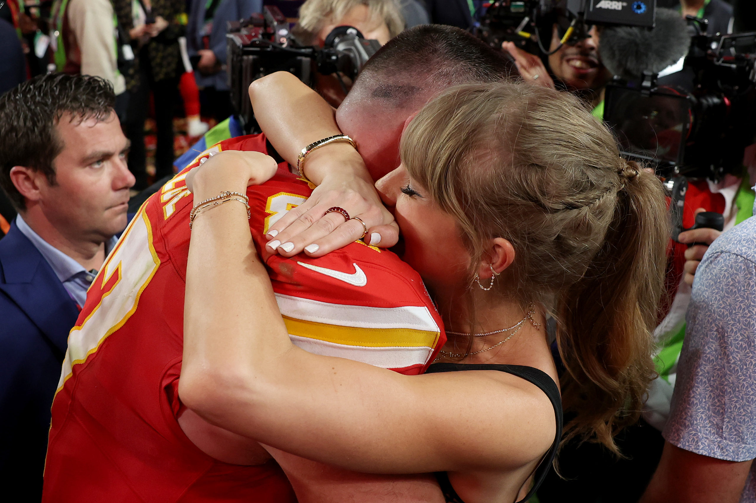 LAS VEGAS, NEVADA - FEBRUARY 11: Travis Kelce #87 of the Kansas City Chiefs hugs Taylor Swift after defeating the San Francisco 49ers 25-22 during Super Bowl LVIII at Allegiant Stadium on February 11, 2024 in Las Vegas, Nevada. Ezra Shaw/Getty Images