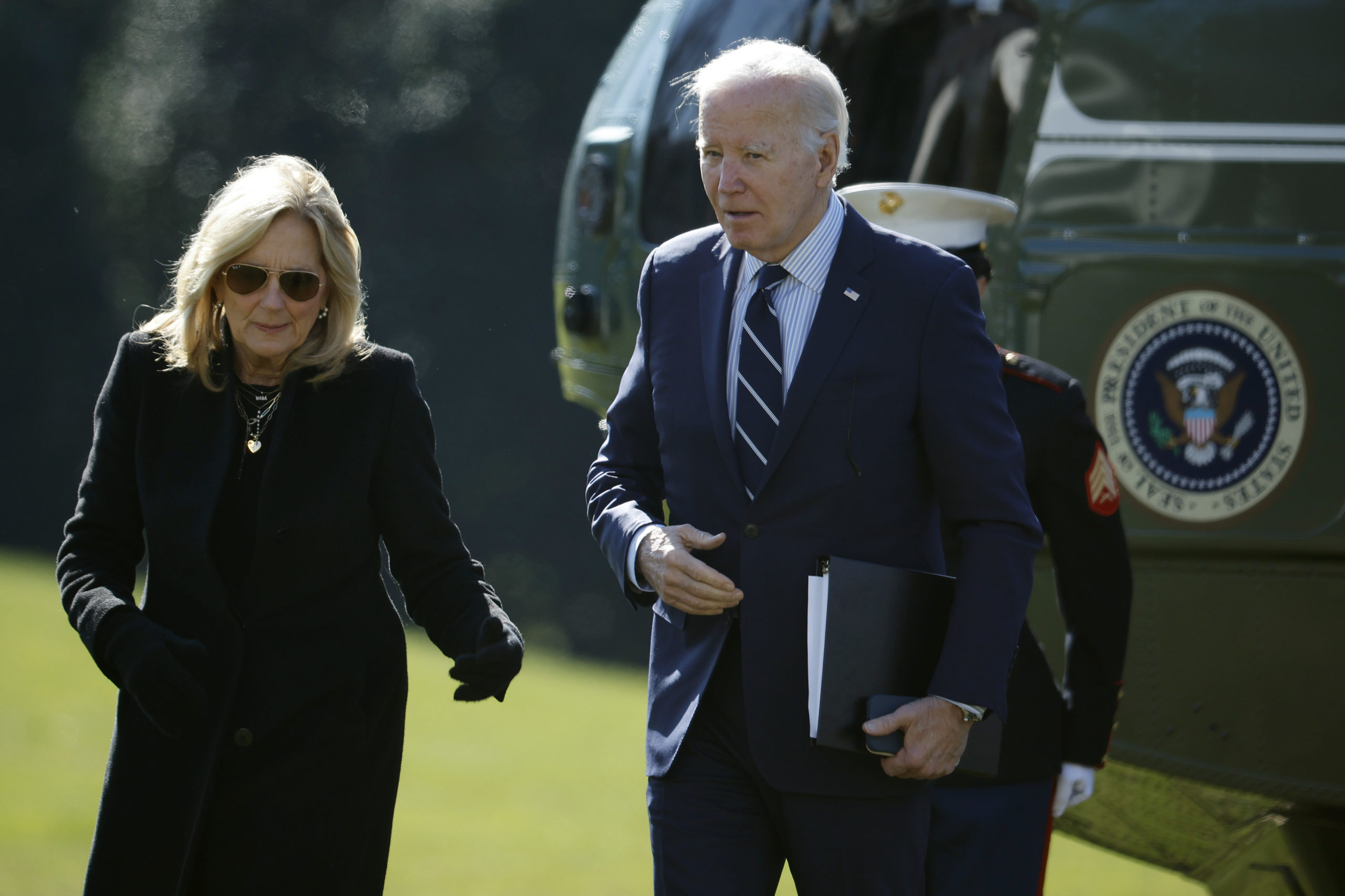  U.S. President Joe Biden and first lady Jill Biden walk across the South Lawn while returning to the White House on February 19, 2024 in Washington, DC. The Bidens returned to the White House after spending the weekend in Delaware. (Photo by Chip Somodevilla/Getty Images)