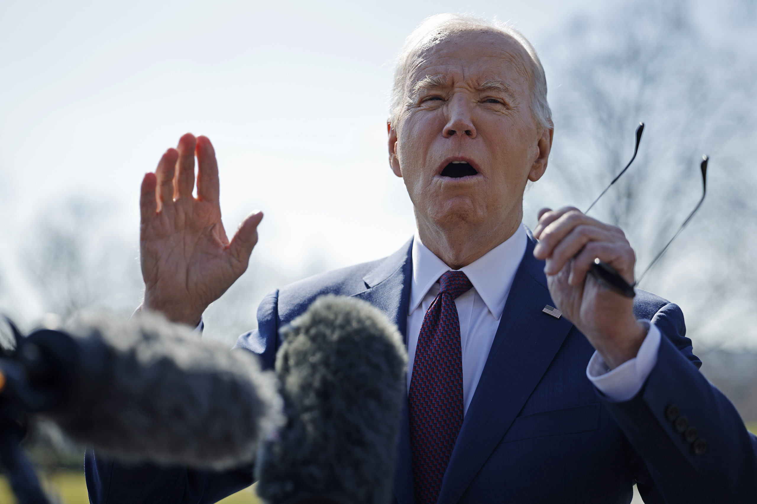 WASHINGTON, DC - FEBRUARY 20: U.S. President Joe Biden stops to talk to journalists about new Russian sanctions as he departs the White House on February 20, 2024 in Washington, DC. Biden is traveling to California to attend campaign receptions across the state. (Photo by Chip Somodevilla/Getty Images)