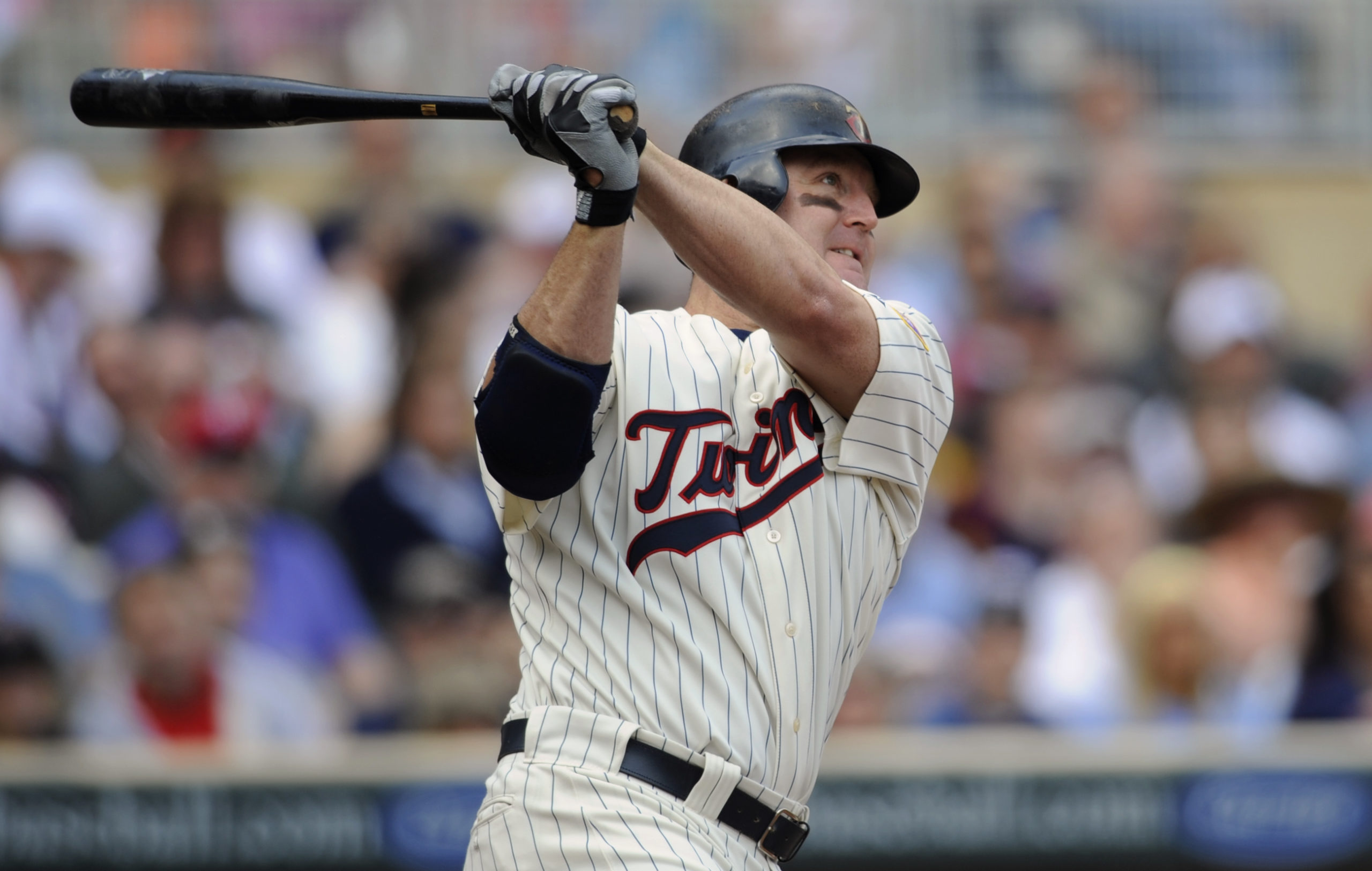 MINNEAPOLIS, MN - APRIL 24: Jim Thome #25 of the Minnesota Twins hits a double against the Cleveland Indians during the seventh inning of their game on April 24, 2011 at Target Field in Minneapolis, Minnesota. Twins defeated the Indians 4-3. Hannah Foslien/Getty Images