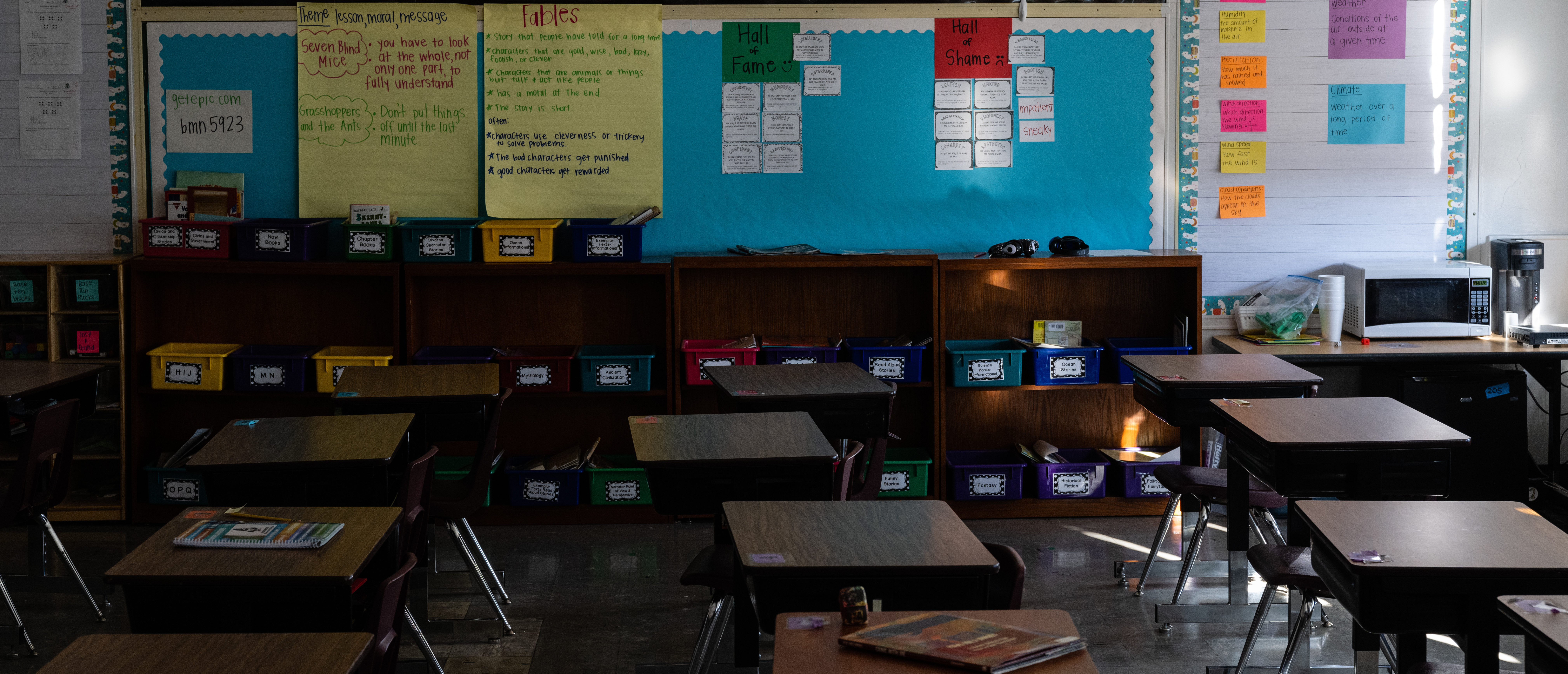 LOUISVILLE, KY - JANUARY 11: Unused desks and cubbies in empty classroom are seen during a period of Non-Traditional Instruction (NTI) at Hazelwood Elementary School on January 11, 2022 in Louisville, Kentucky. (Photo by Jon Cherry/Getty Images)