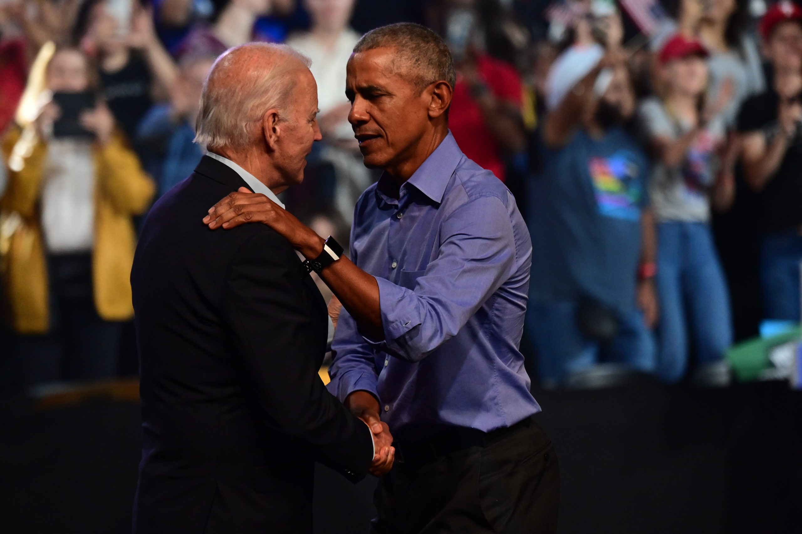 President Joe Biden (L) and former U.S. President Barack Obama (R) embrace on stage during a rally for Pennsylvania Democratic Senate nominee John Fetterman and Democratic gubernatorial nominee Josh Shapiro at the Liacouras Center on November 5, 2022 in Philadelphia, Pennsylvania. Fetterman will face Republican nominee Dr. Mehmet Oz as Shapiro faces Republican Doug Mastriano on November 8 in the midterm general election. (Photo by Mark Makela/Getty Images)