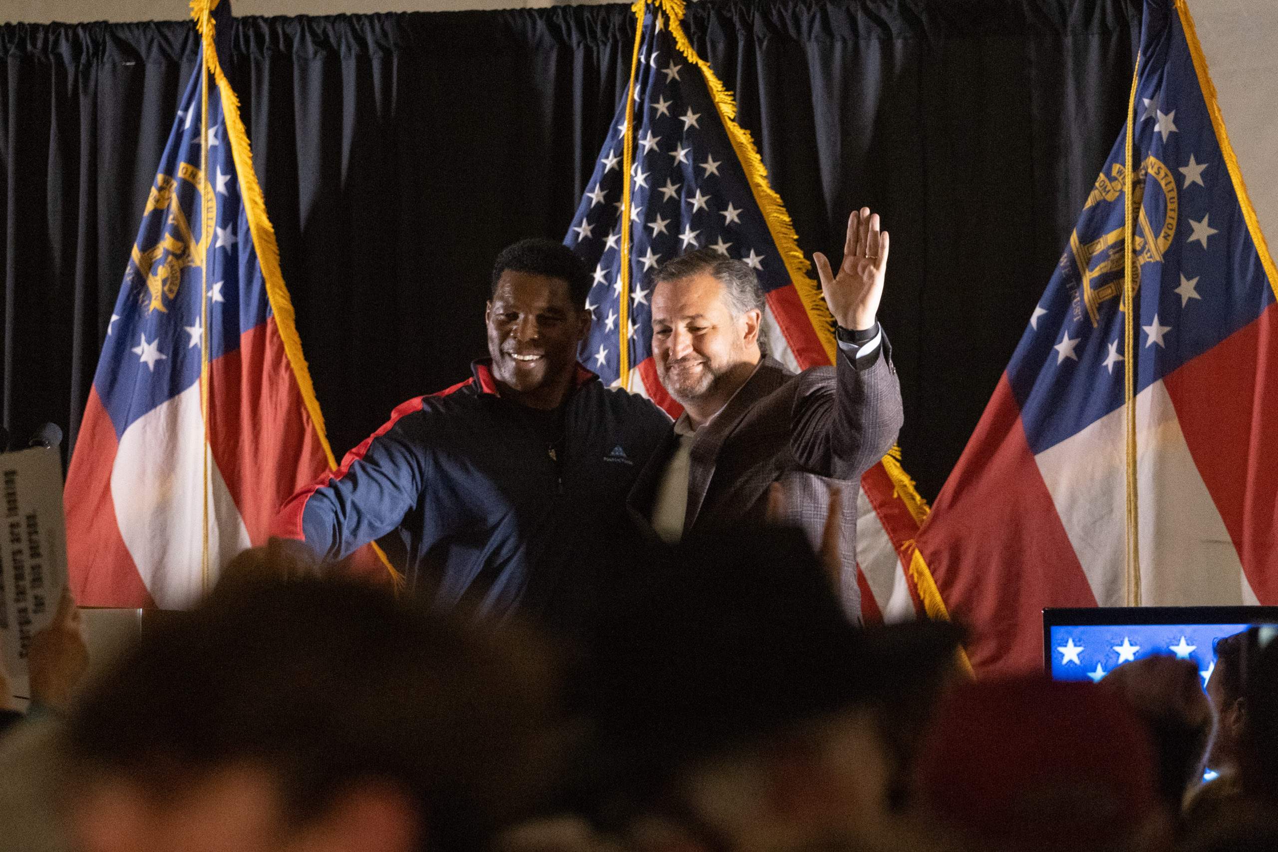  U.S. Sen. Ted Cruz (R-TX) (R) campaigns for Republican Senate candidate Herschel Walker at a rally at The Mill on Etowahon November 10, 2022 in Canton, Georgia. The University of Georgia 1982 Heisman Trophy winner and former NFL running back faces incumbent Sen. Raphael Warnock (D-GA) in a runoff on December 6. (Photo by Megan Varner/Getty Images)