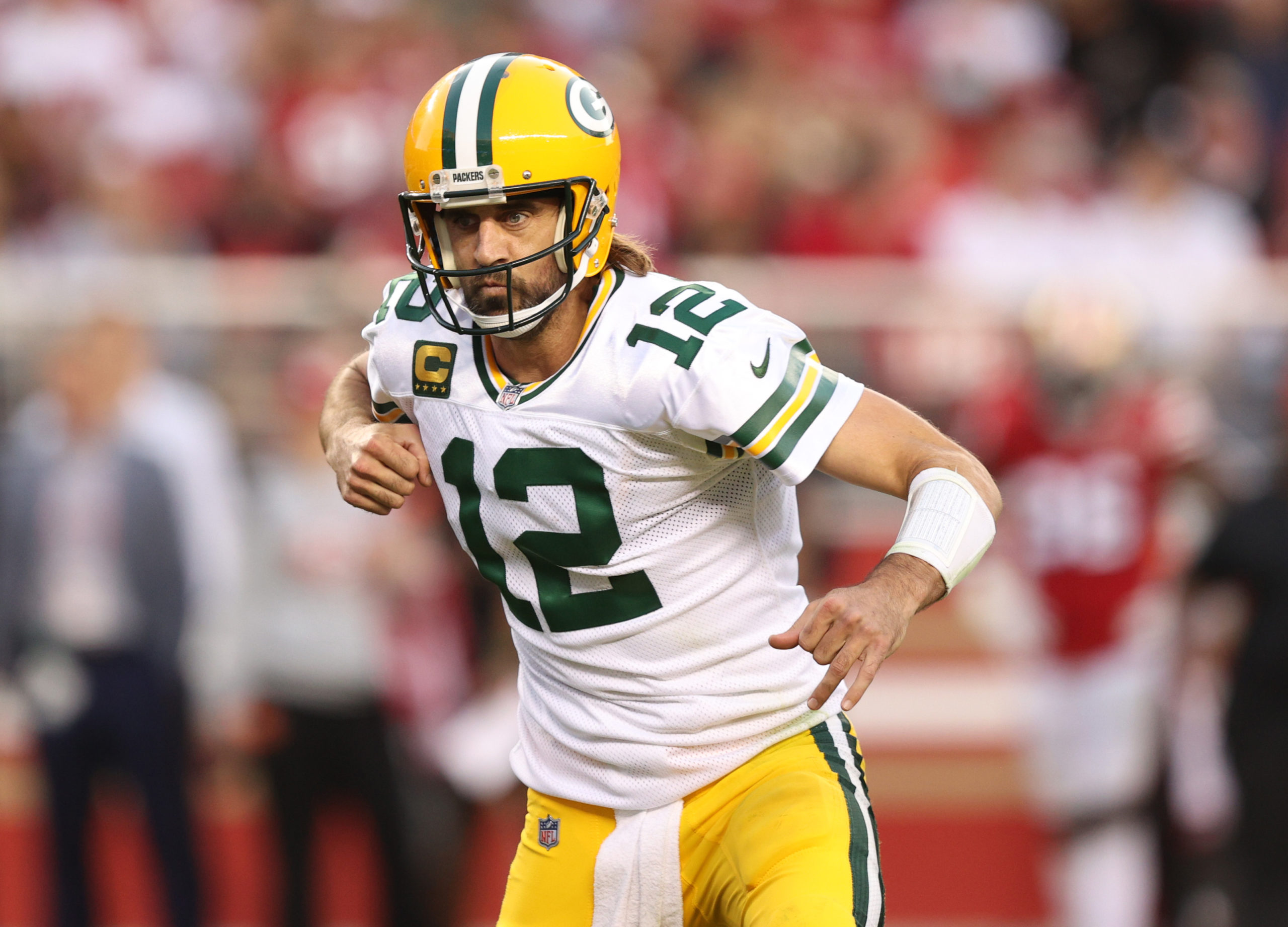 SANTA CLARA, CALIFORNIA - SEPTEMBER 26: Aaron Rodgers #12 of the Green Bay Packers celebrates after a touchdown during the second quarter against the San Francisco 49ers in the game at Levi's Stadium on September 26, 2021 in Santa Clara, California. Ezra Shaw/Getty Images