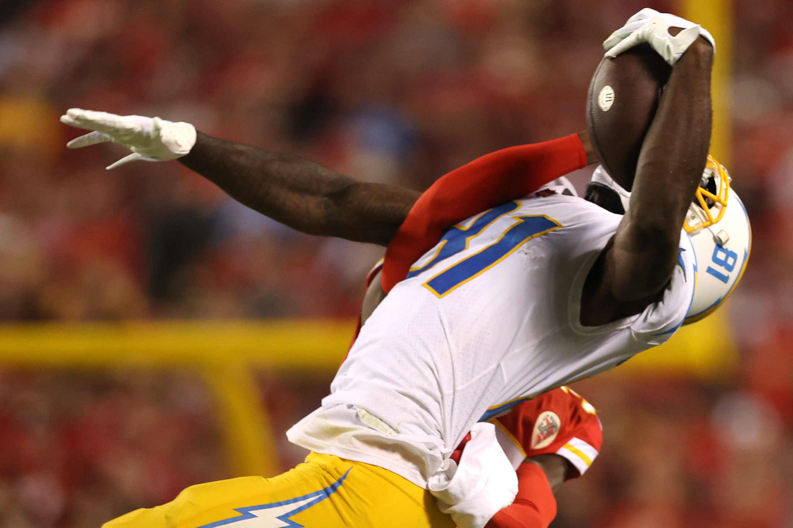 KANSAS CITY, MISSOURI - SEPTEMBER 15: Mike Williams #81 of the Los Angeles Chargers catches the ball during the first half against the Kansas City Chiefs at Arrowhead Stadium on September 15, 2022 in Kansas City, Missouri. Jamie Squire/Getty Images