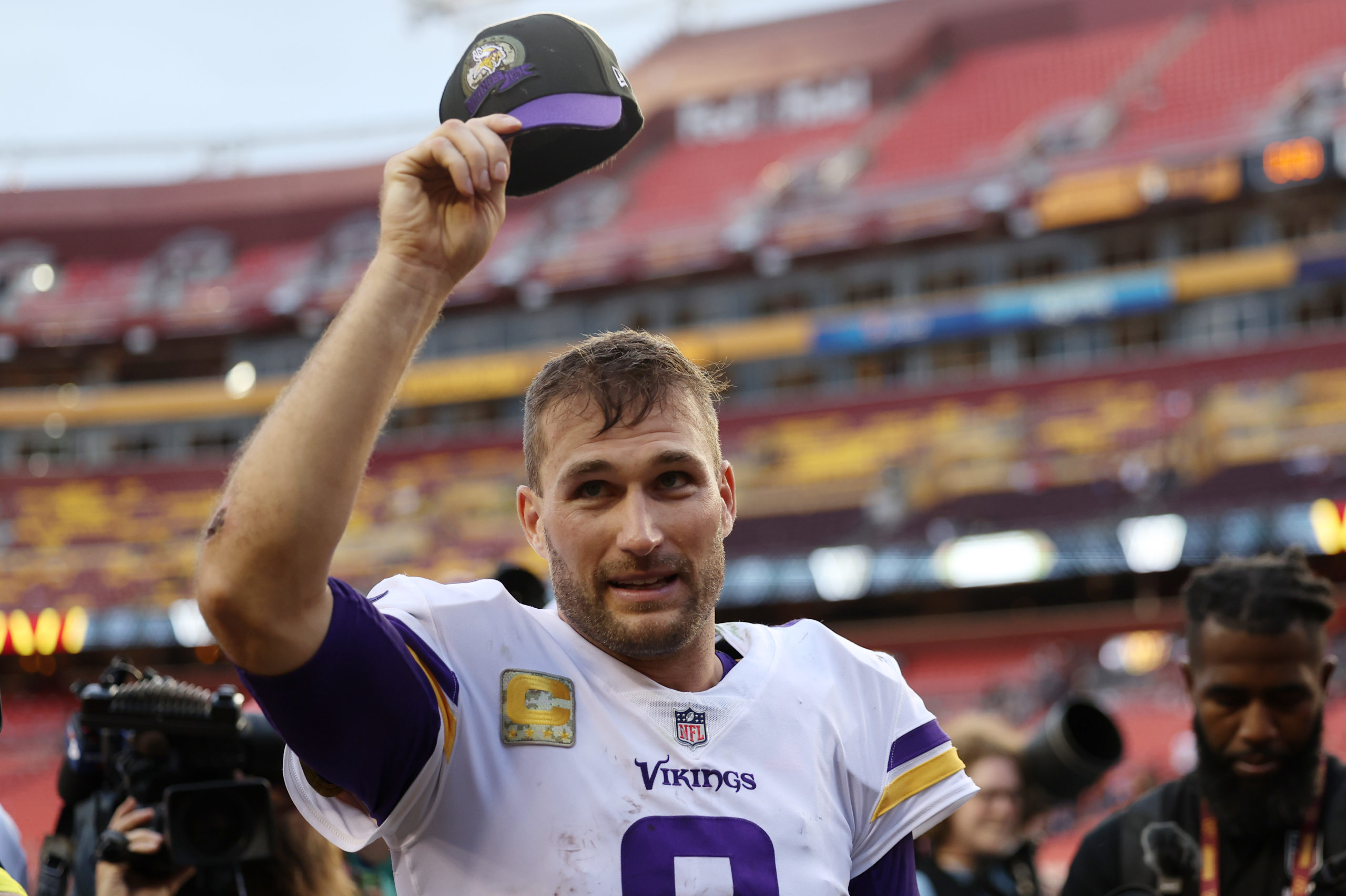 LANDOVER, MARYLAND - NOVEMBER 06: Kirk Cousins #8 of the Minnesota Vikings celebrates after the Wikings defeated the Washington Commanders 20-17 at FedExField on November 06, 2022 in Landover, Maryland. Scott Taetsch/Getty Images