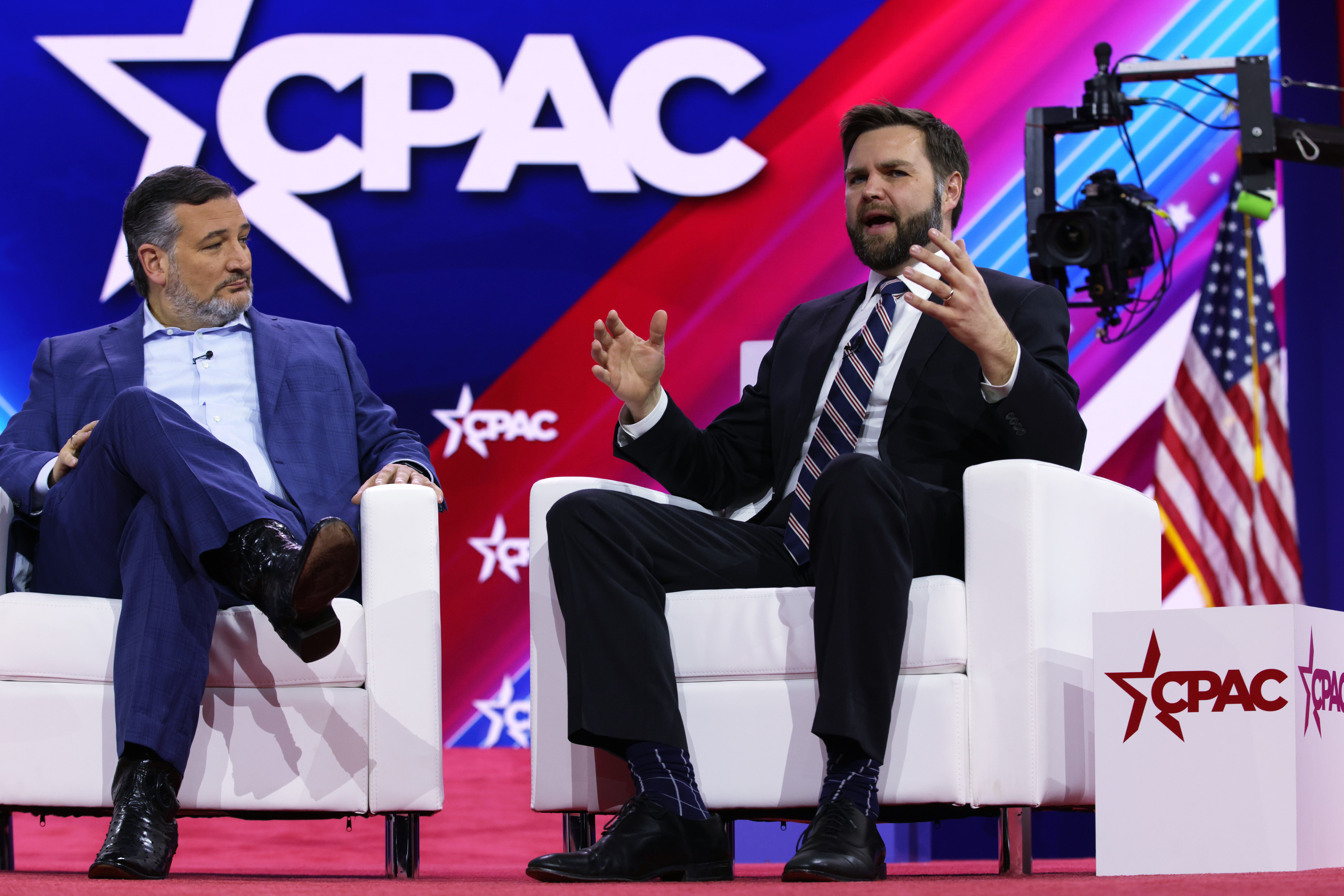 U.S. Sen. J.D. Vance (R-OH) (R) speaks as Sen. Ted Cruz (R-TX) (L) listens during the annual Conservative Political Action Conference (CPAC) at Gaylord National Resort & Convention Center on March 2, 2023 in National Harbor, Maryland. The annual conservative conference kicks off today with former President Donald Trump addressing the event on Saturday. (Photo by Alex Wong/Getty Images)