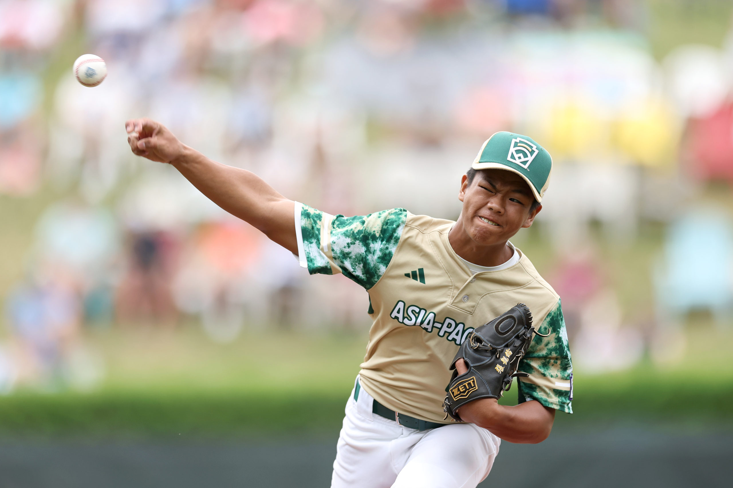 SOUTH WILLIAMSPORT, PENNSYLVANIA - AUGUST 27: Fan Chen-Jun #17 of the Asia-Pacific Region team from Taipei City, Chinese Taipei pitches during the first inning against the Southwest Region team from Needville, Texas during the Little League World Series Consolation Game at Little League International Complex on August 27, 2023 in South Williamsport, Pennsylvania. (Photo by Tim Nwachukwu/Getty Images)
